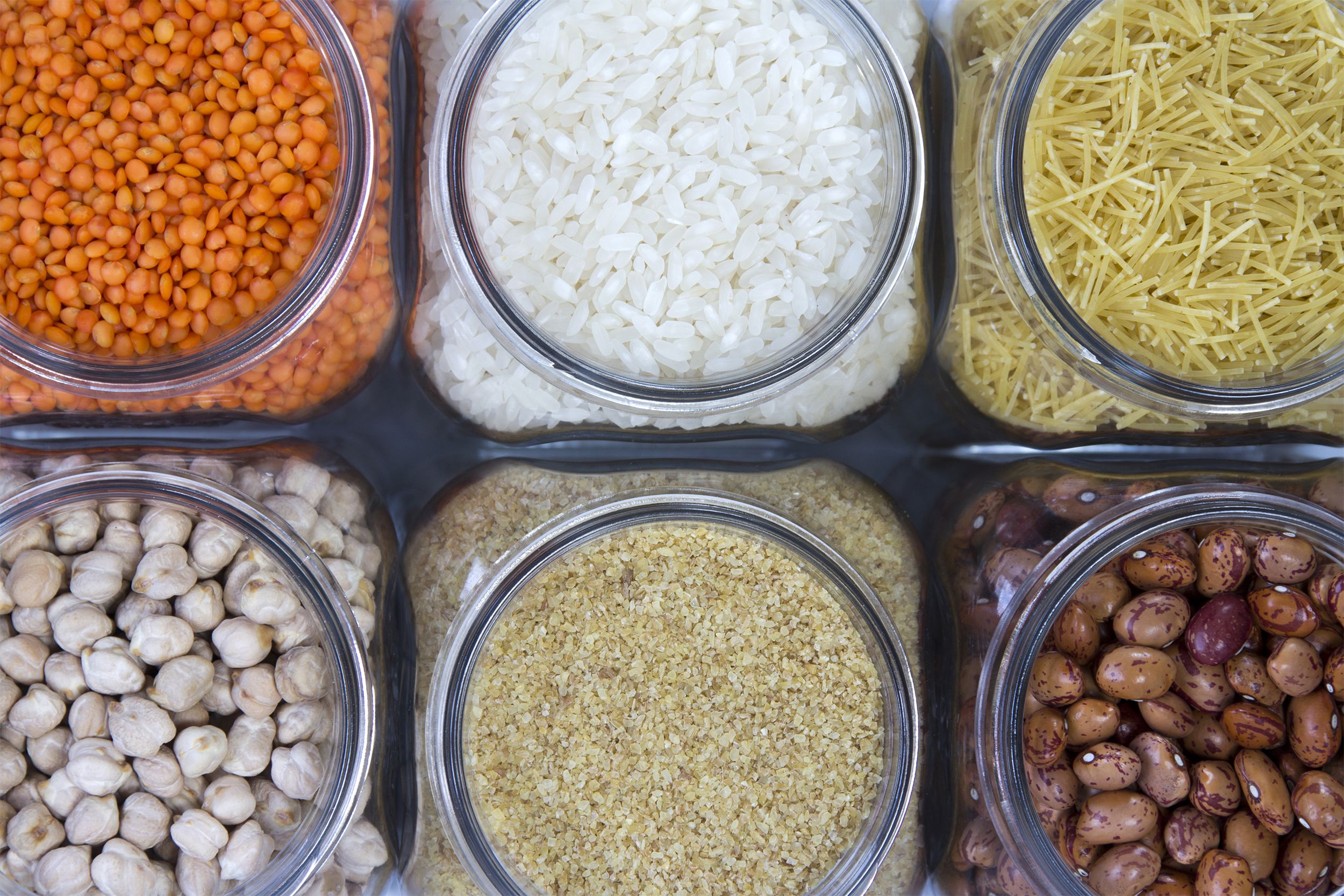 Assorted grains and legumes in jars