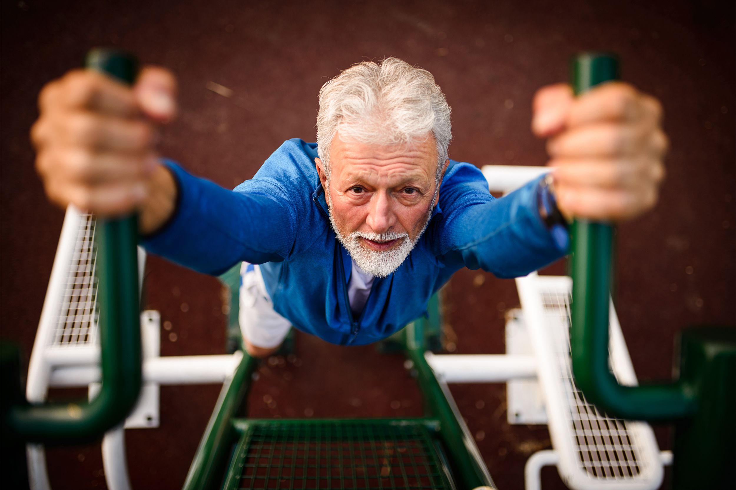 Senior man doing pull-ups
