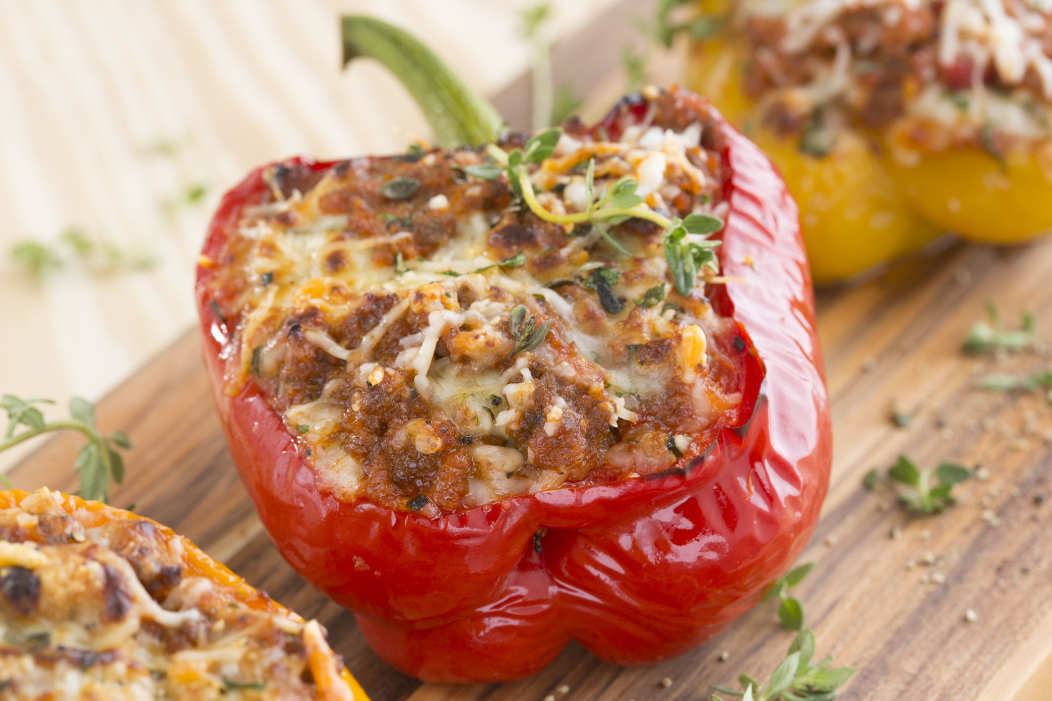 Stuffed bell peppers studio shot. Close-up. Horizontal composition. High angle view.