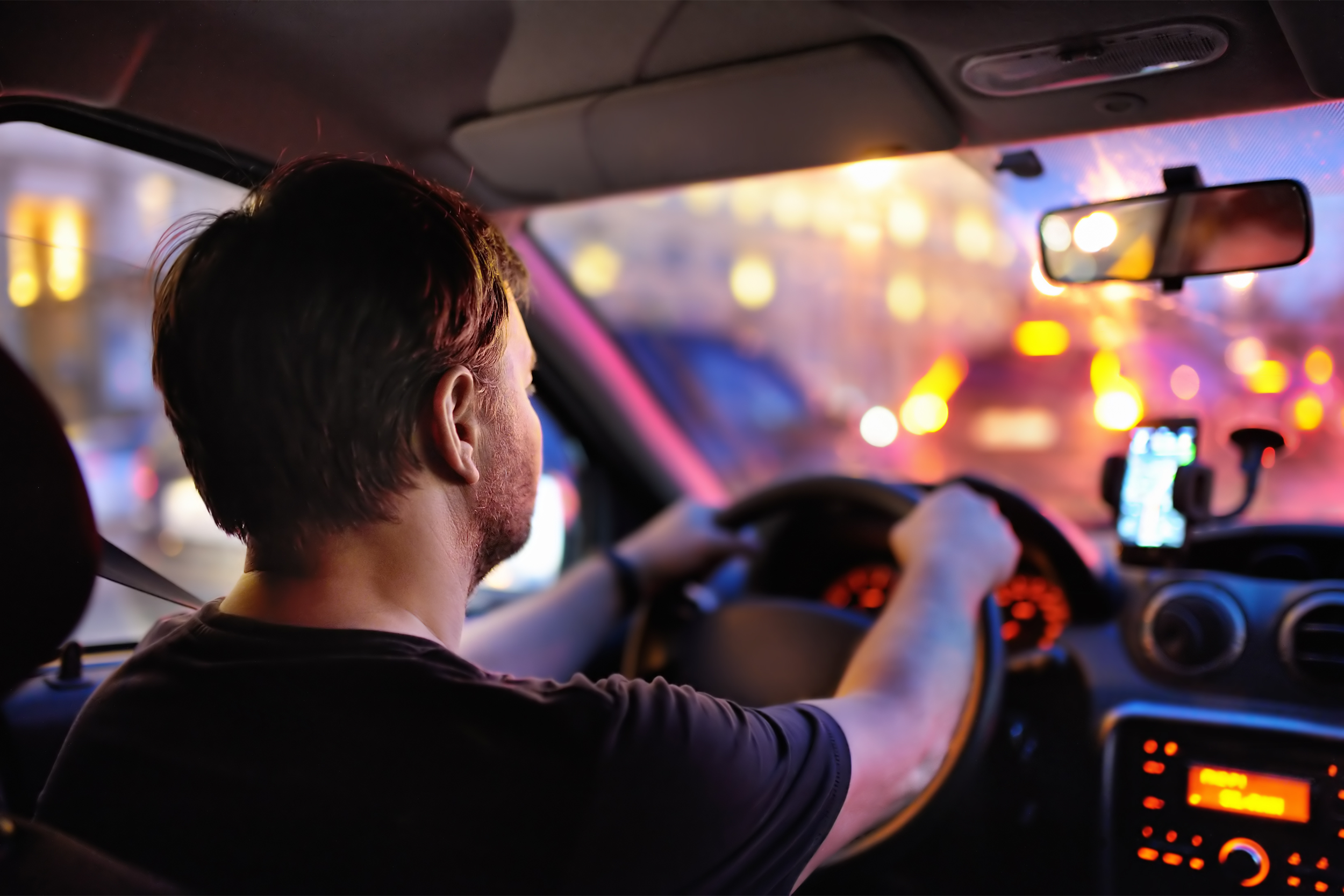 man driving in traffic