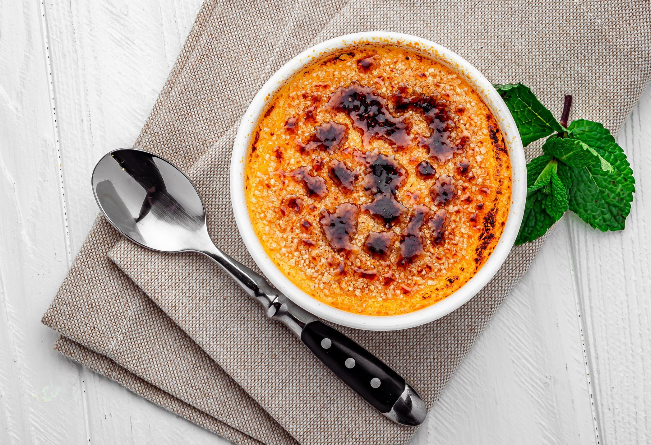 Traditional french vanilla cream dessert with caramelized sugar. Healthy food. Photo for the menu.