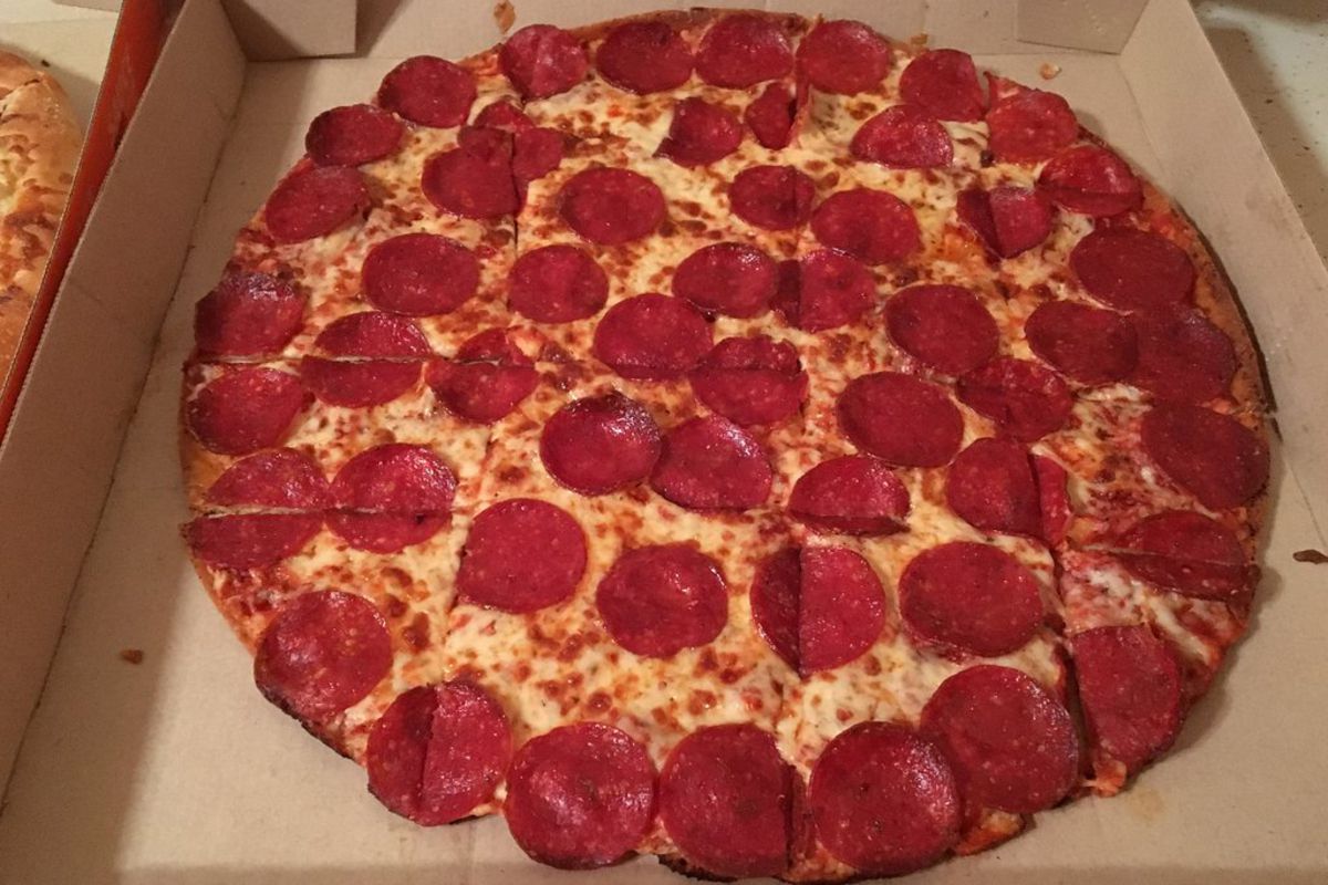 Little Caesars extra large pepperoni pizza in a pizza box