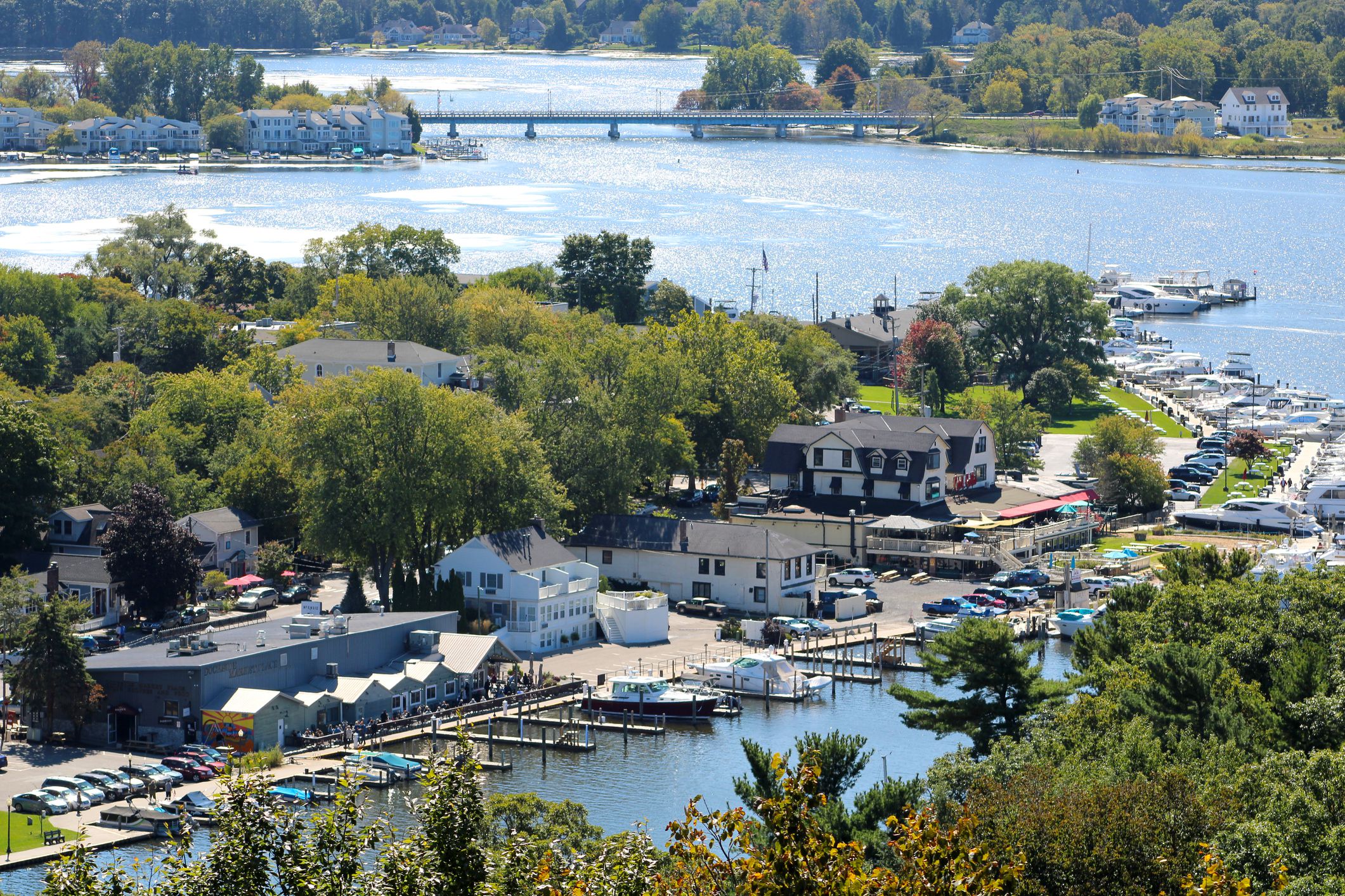Towns of Douglas and Saugatuck Michigan - Aerial View from the top of Mt. Baldhead - Connected by a bridge over the Kalamazoo river
