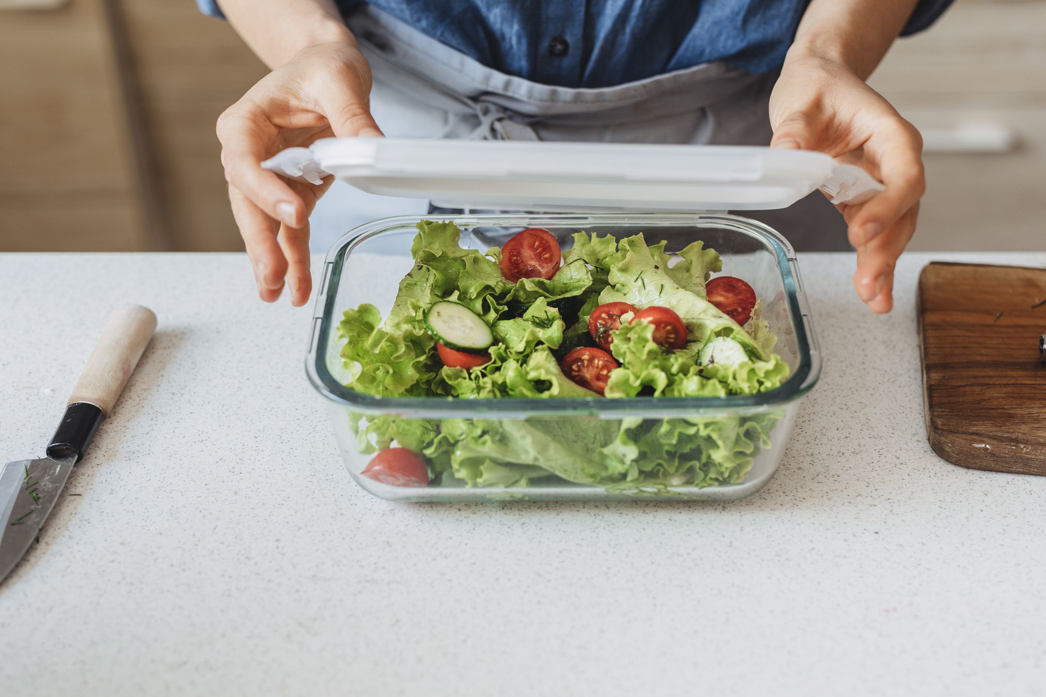 Homemade takeaway meal: a healthy vegetable salad in a glass container.