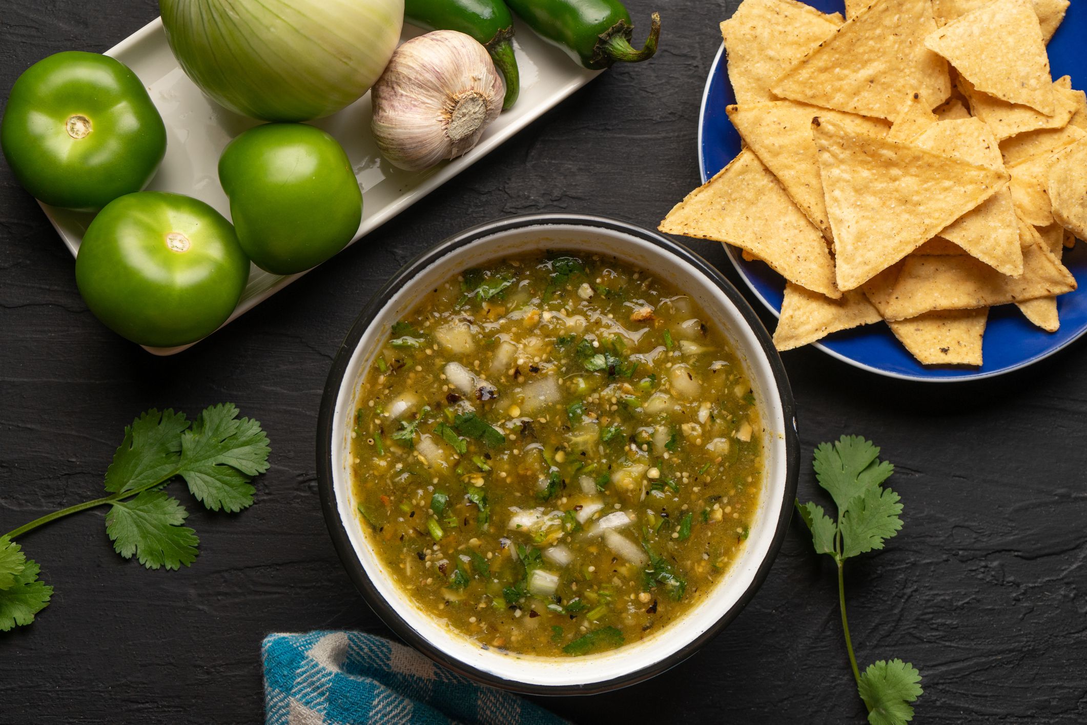Green hot sauce with jalapeno pepper. Traditional mexican food