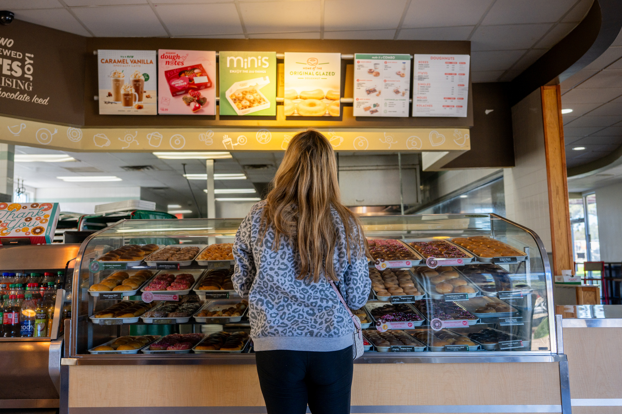 Woman Ordering Donut at a Krispy Kreme, Austin, Texas