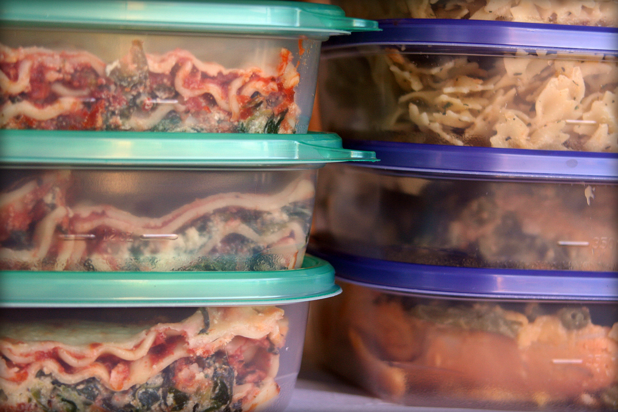 Closeup of Leftovers in Containers in the Freezer for Future Meals