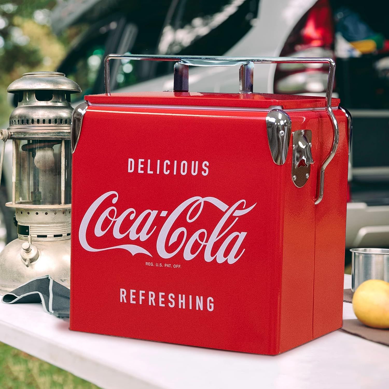 A cooler with the coca cola logo on it