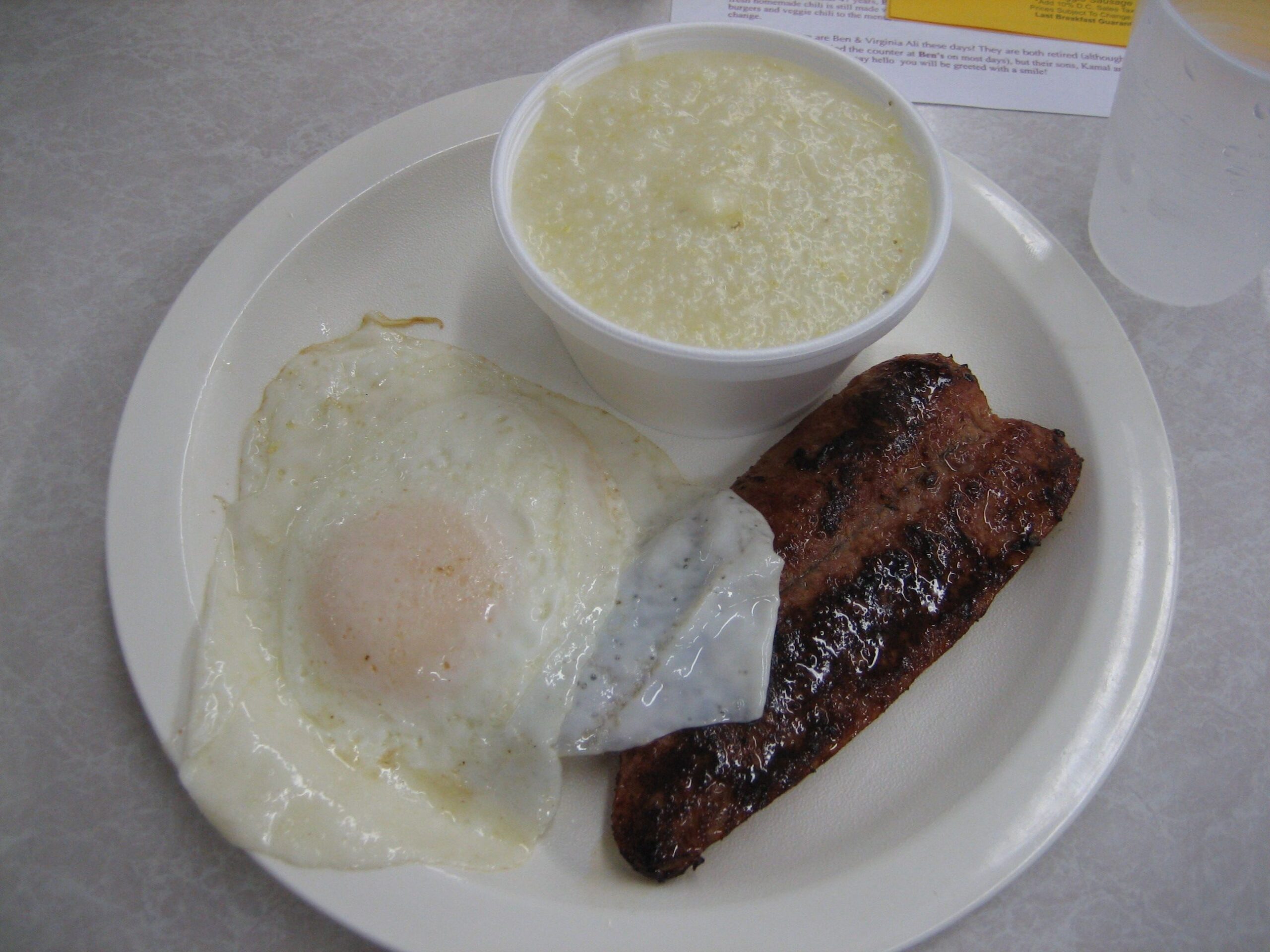 Half-smoke breakfast with eggs and grits from Ben's Chili Bowl