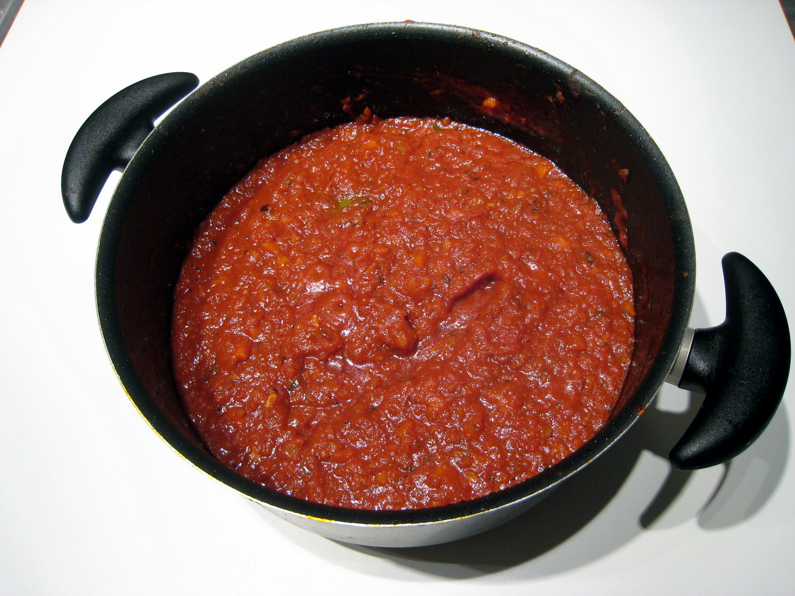 Making Marinara Sauce in a Pot on the Kitchen Countertop