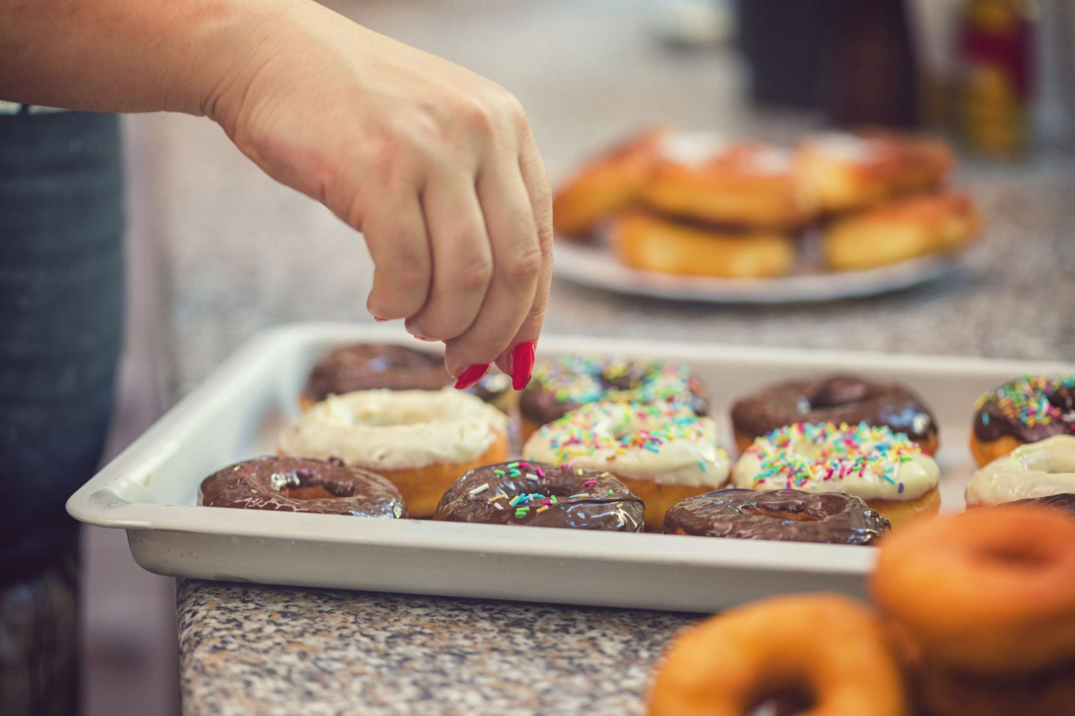 Woman Making Donuts