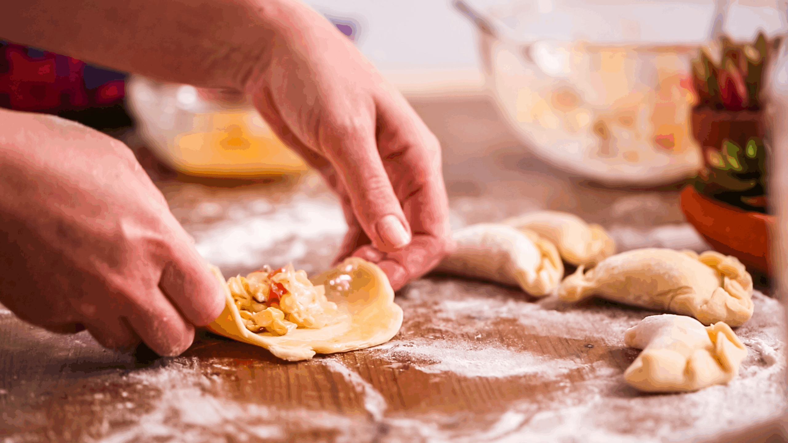 Woman Making Empanadas