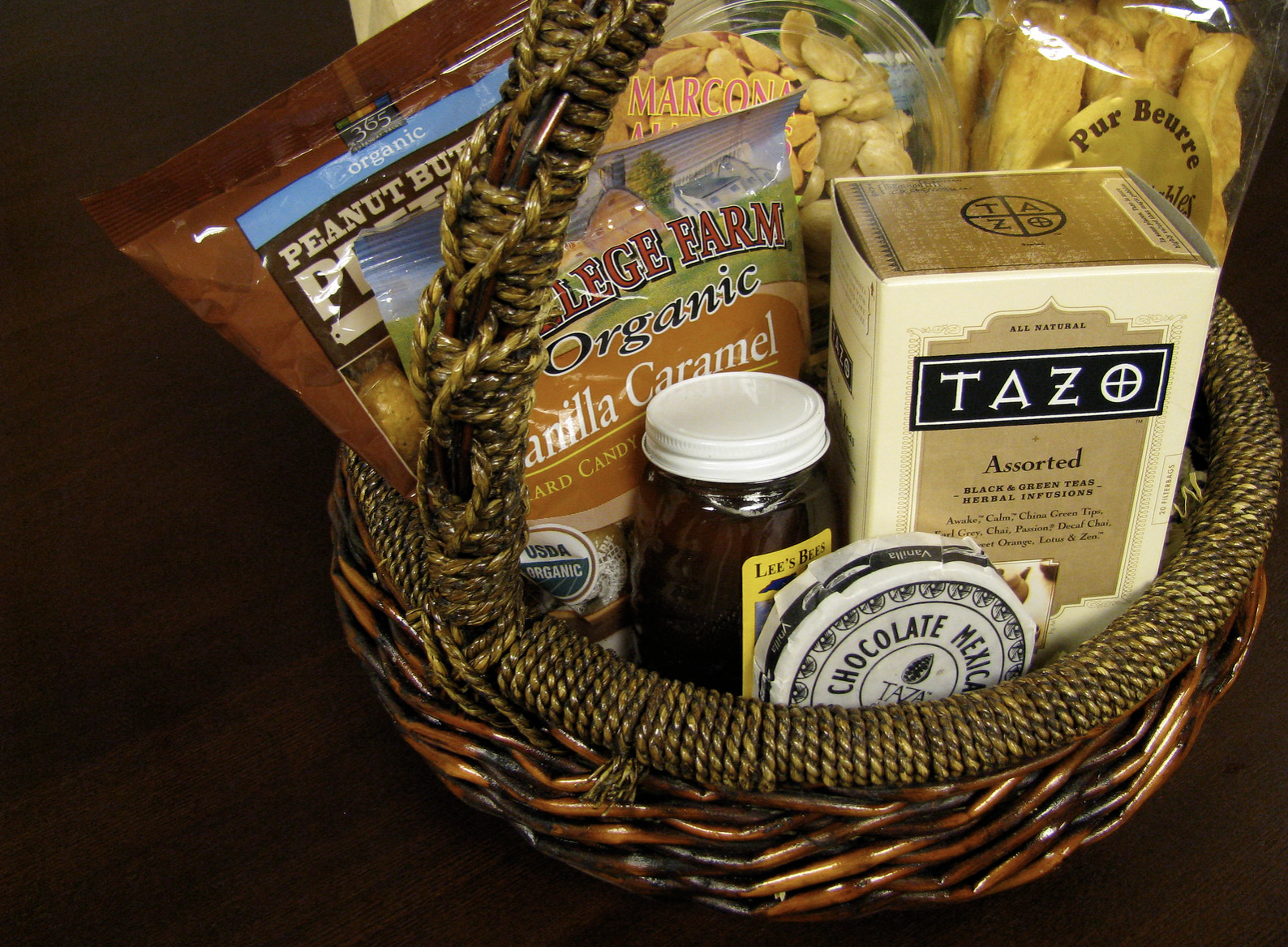 specialty wrapped gift basket with honey and tea