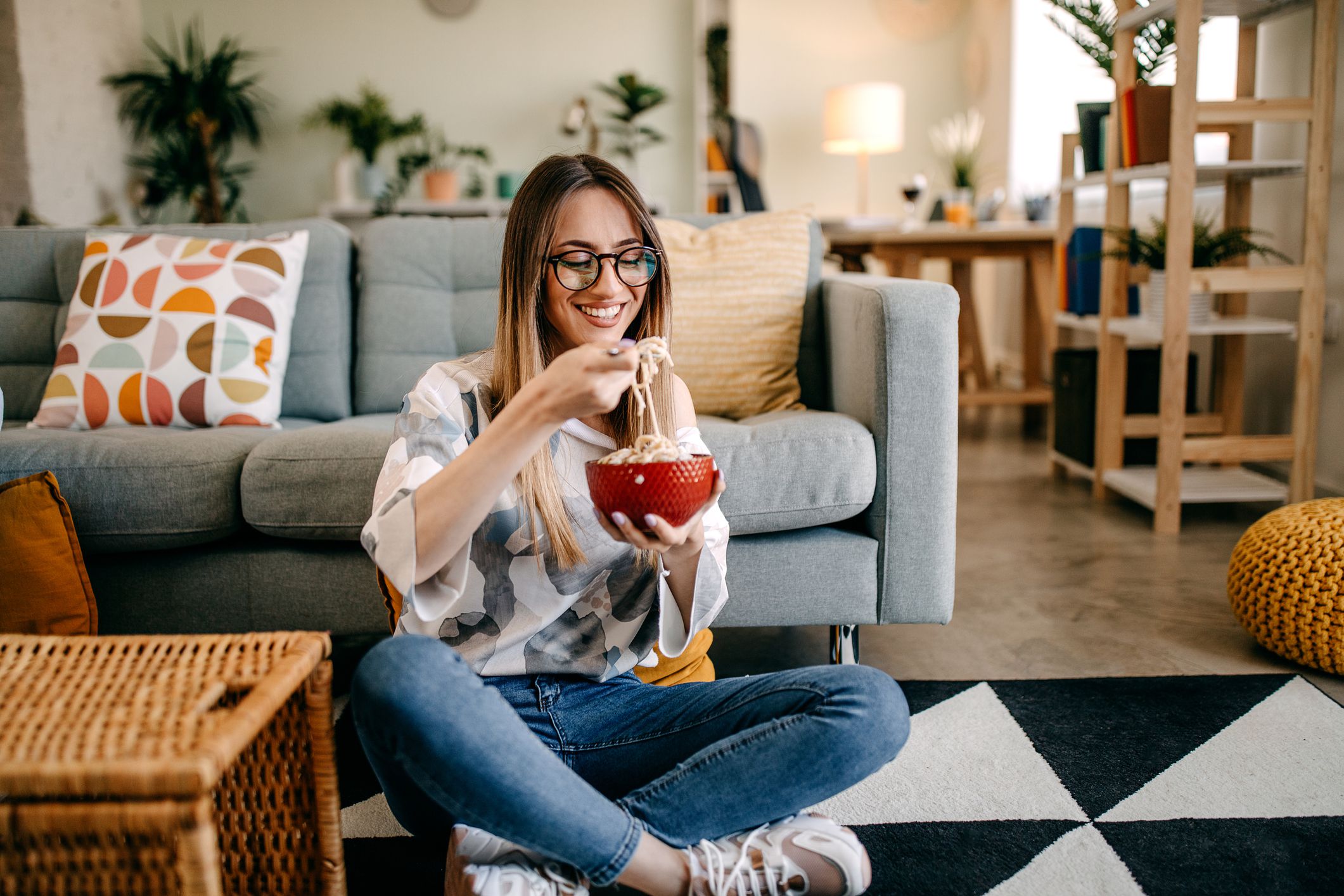 Woman eating spaghetti bolognese