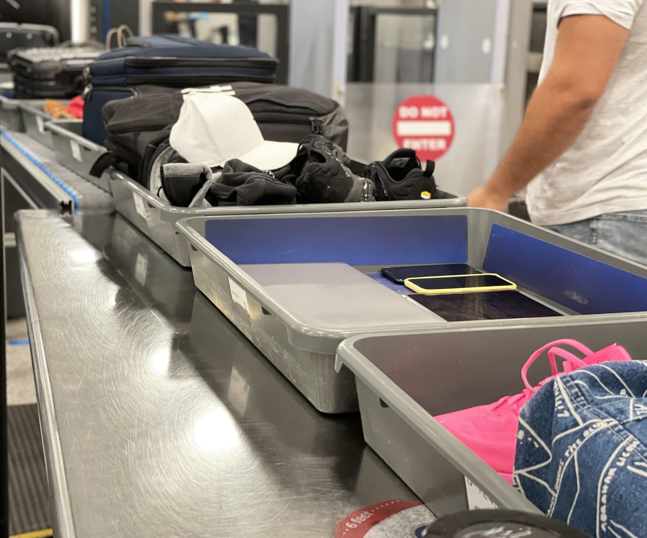 Check in luggages going through security line
