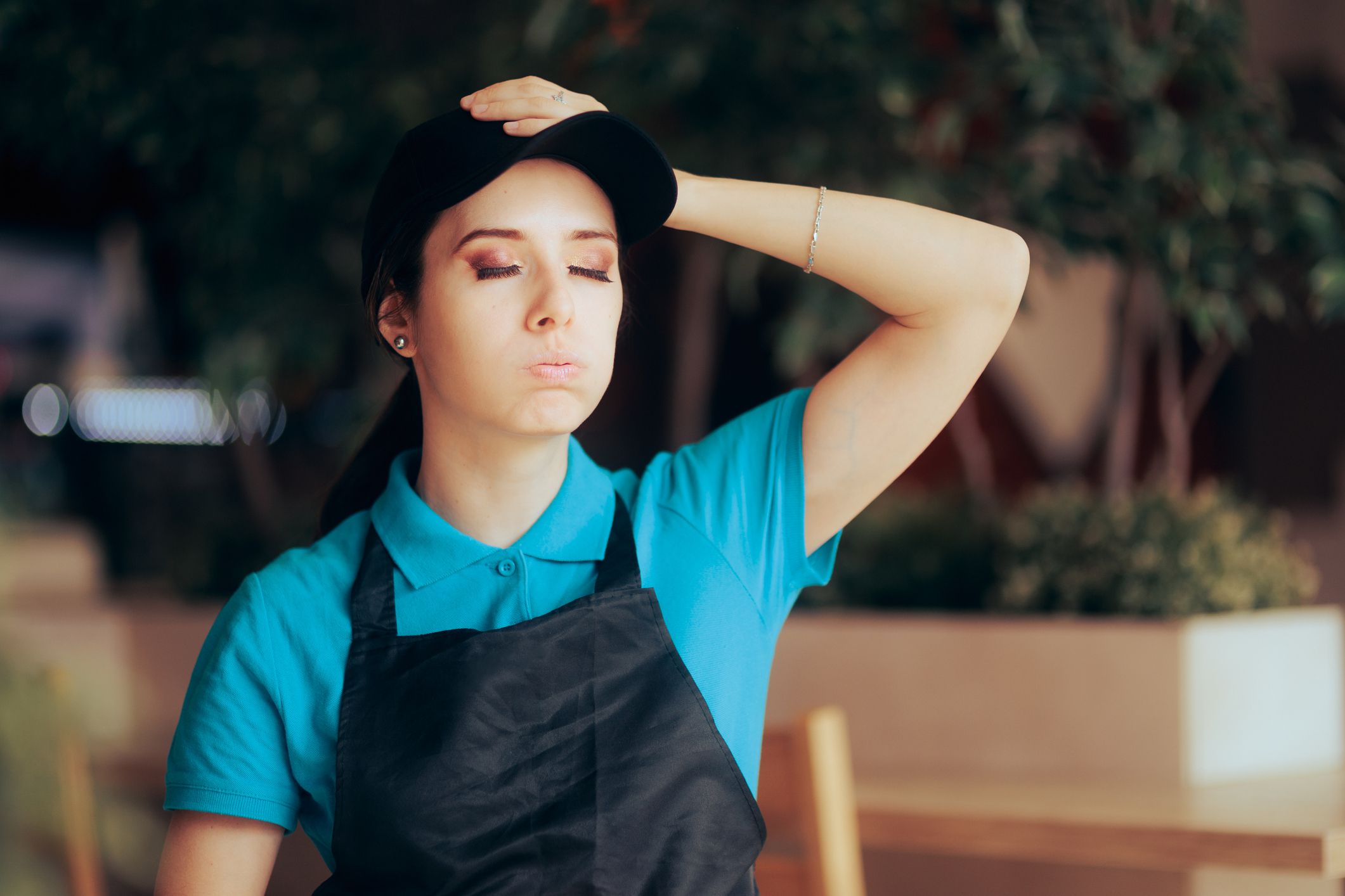 Tired and unhappy employee felling a worried and anxious
