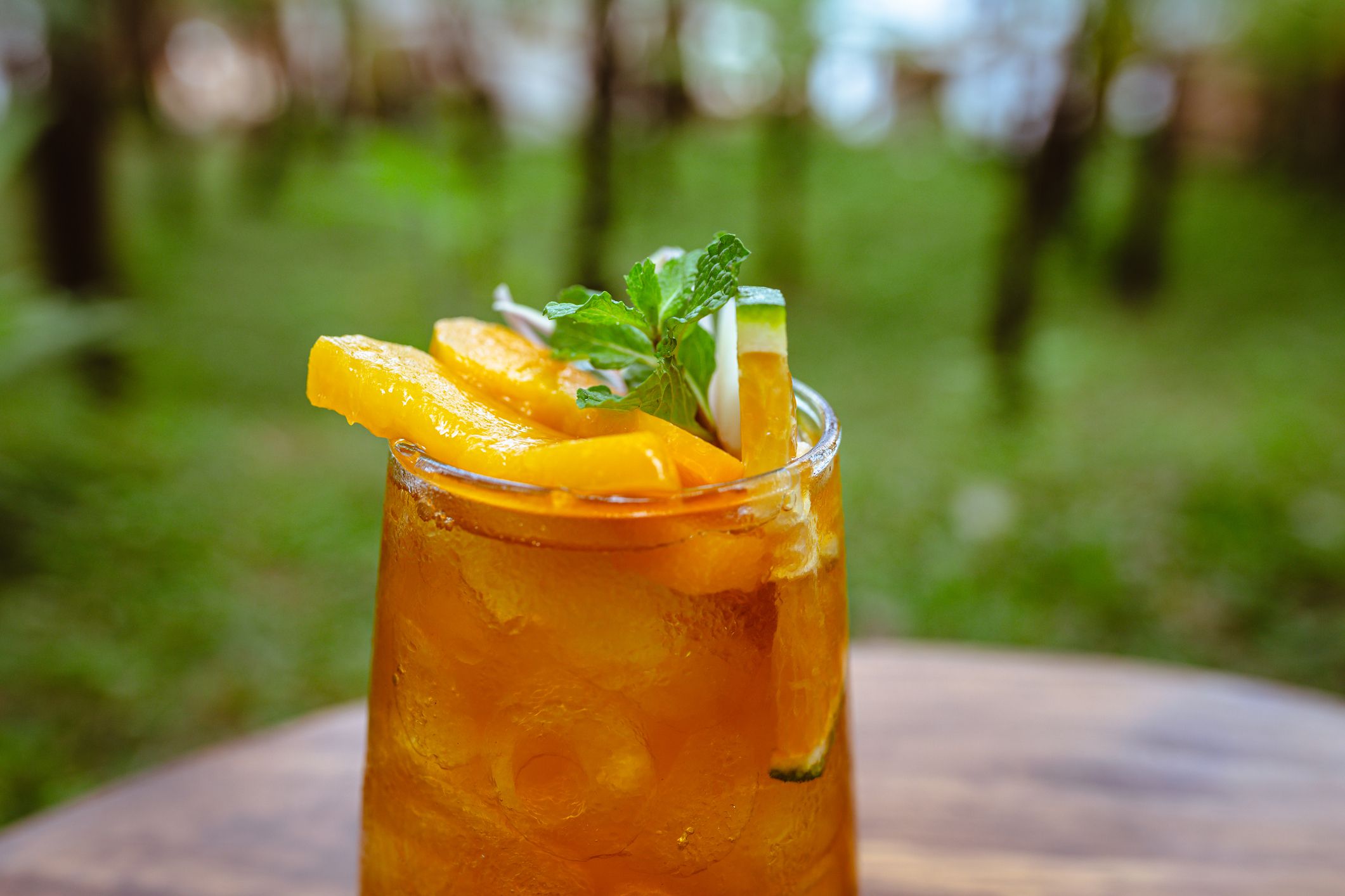 Mocktail Peach Ice Tea With Orange Juices, Lemongrass Drinking Glass High Resolution Stock Photo