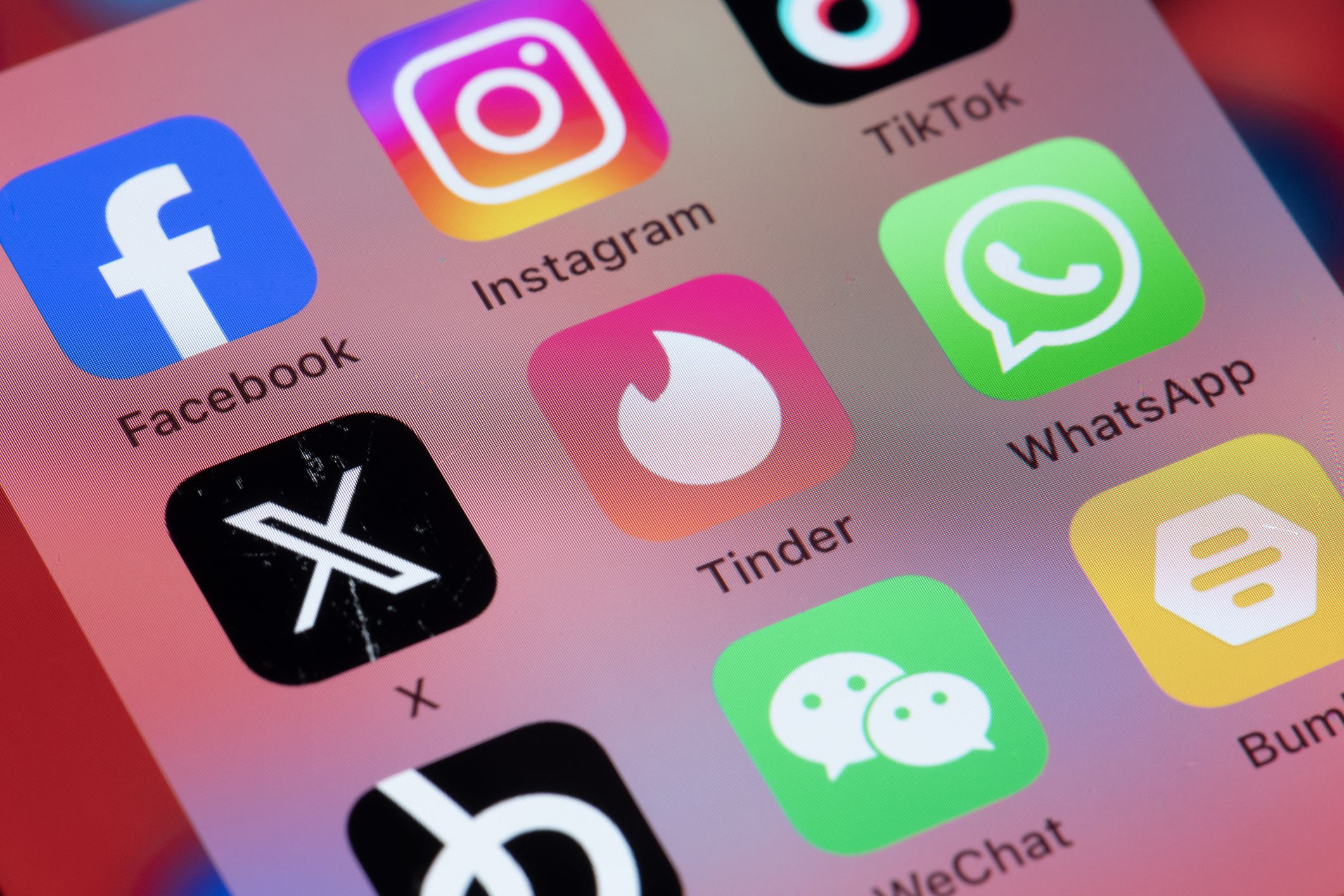 İstanbul, Turkey - November 8, 2023: Online dating services applications Tinder, Bumble and Hppn on smart phone screen.
