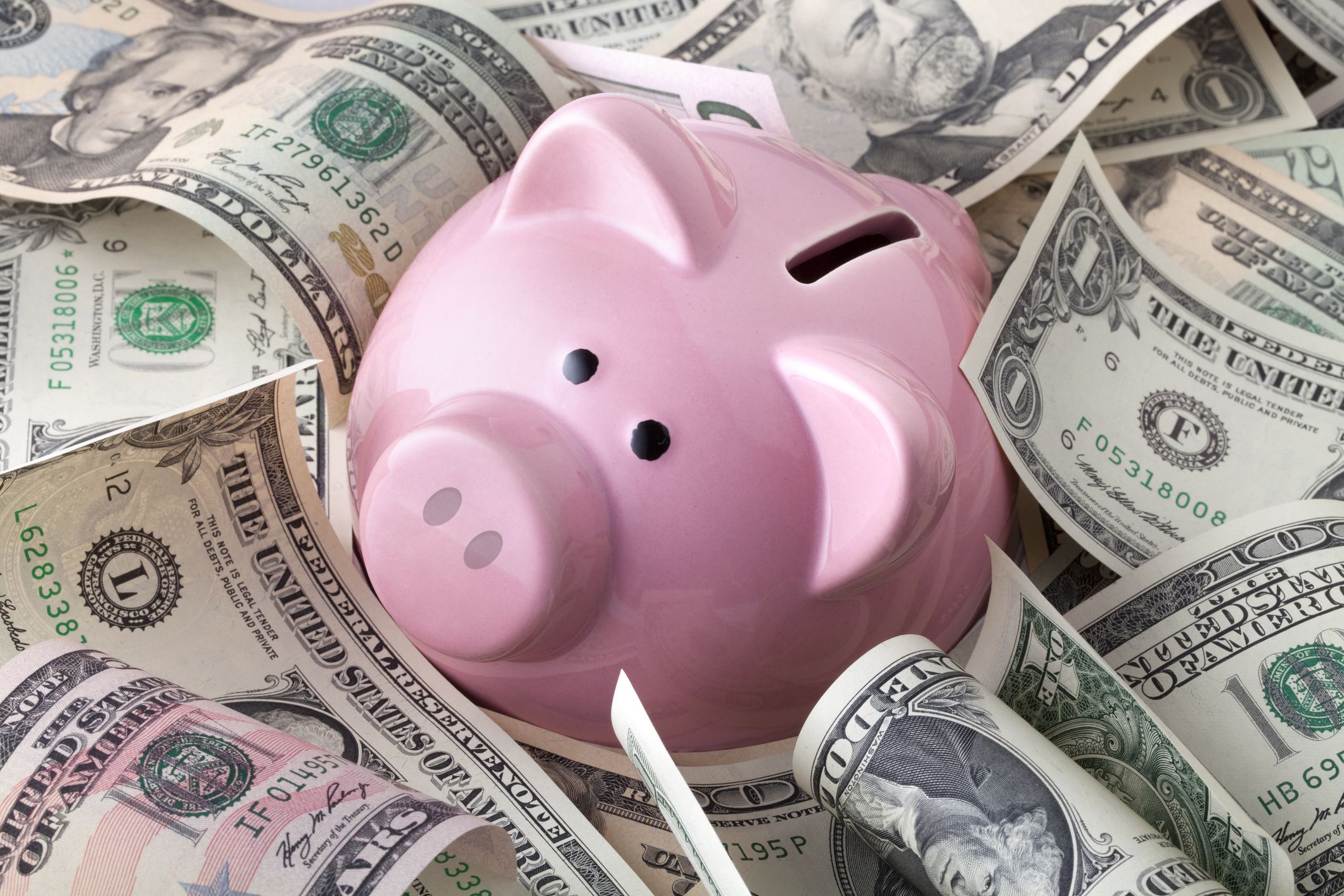 Piggy bank with dollars banknotes.Some similar pictures from my portfolio: