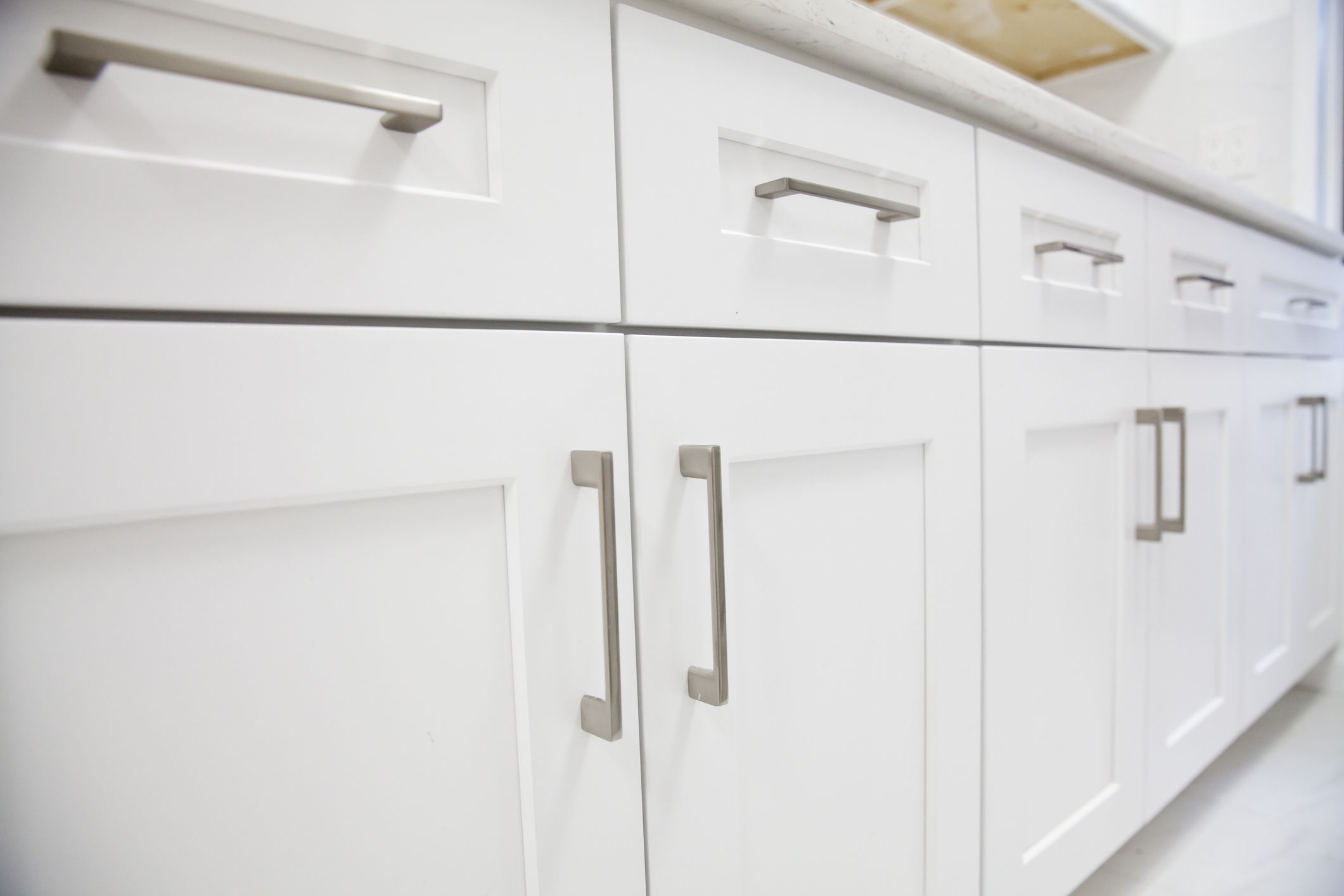 White kitchen cabinet in kitchen