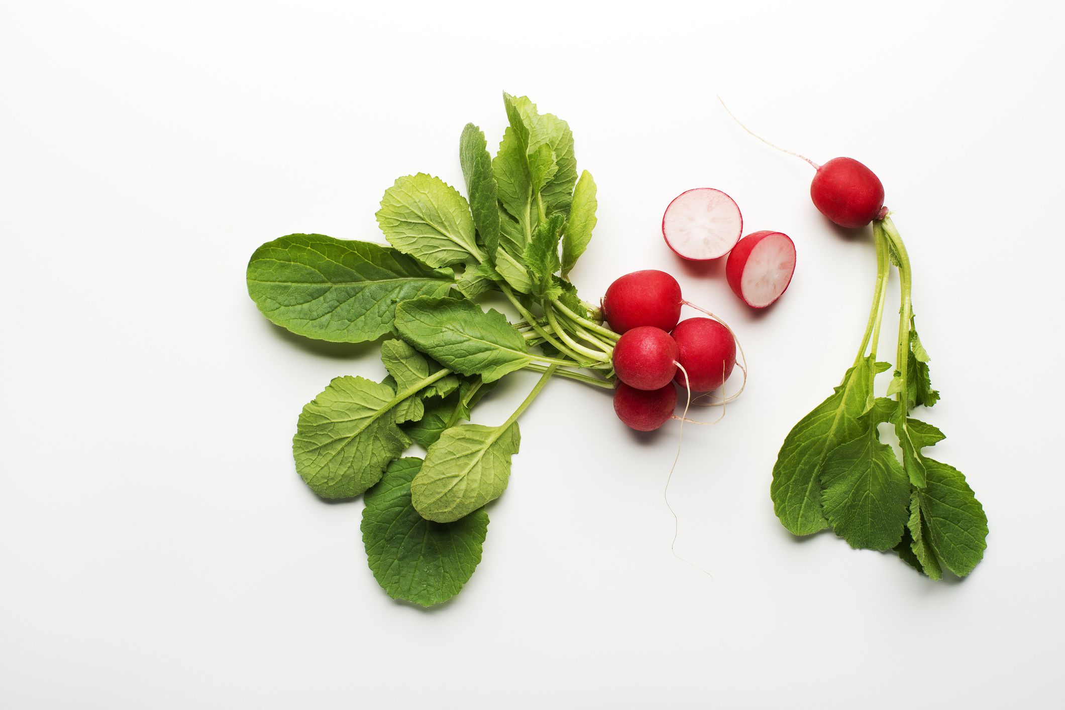 Fresh red radish isolated on a white background close up.