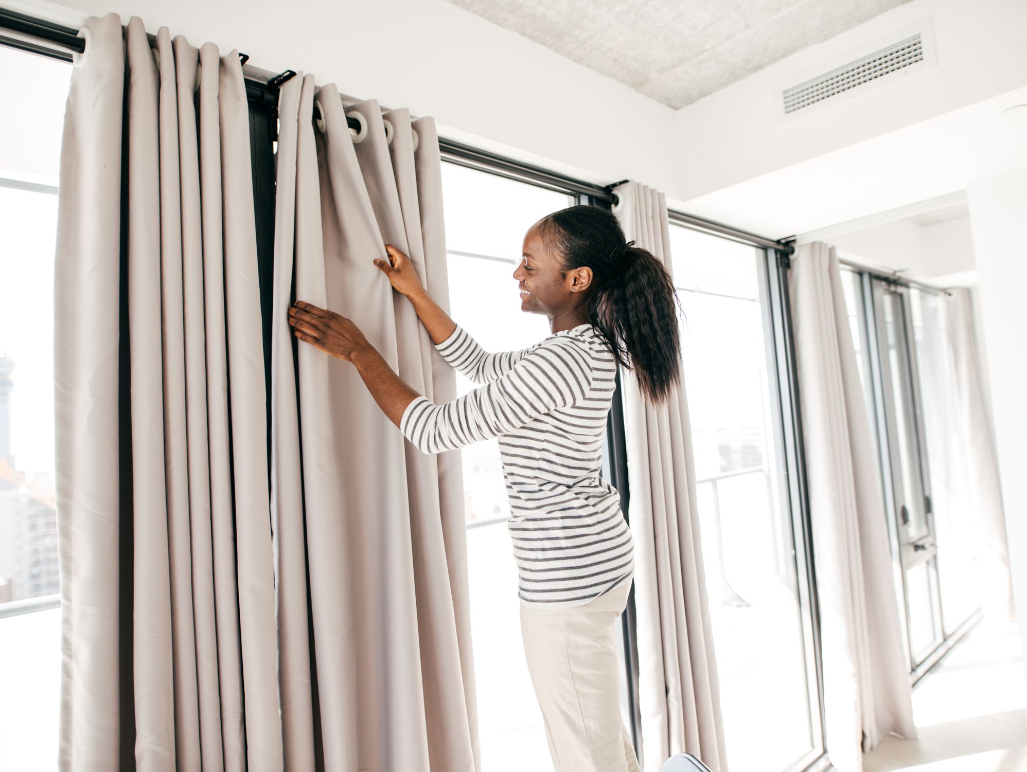 Redecorating windows with new curtains
