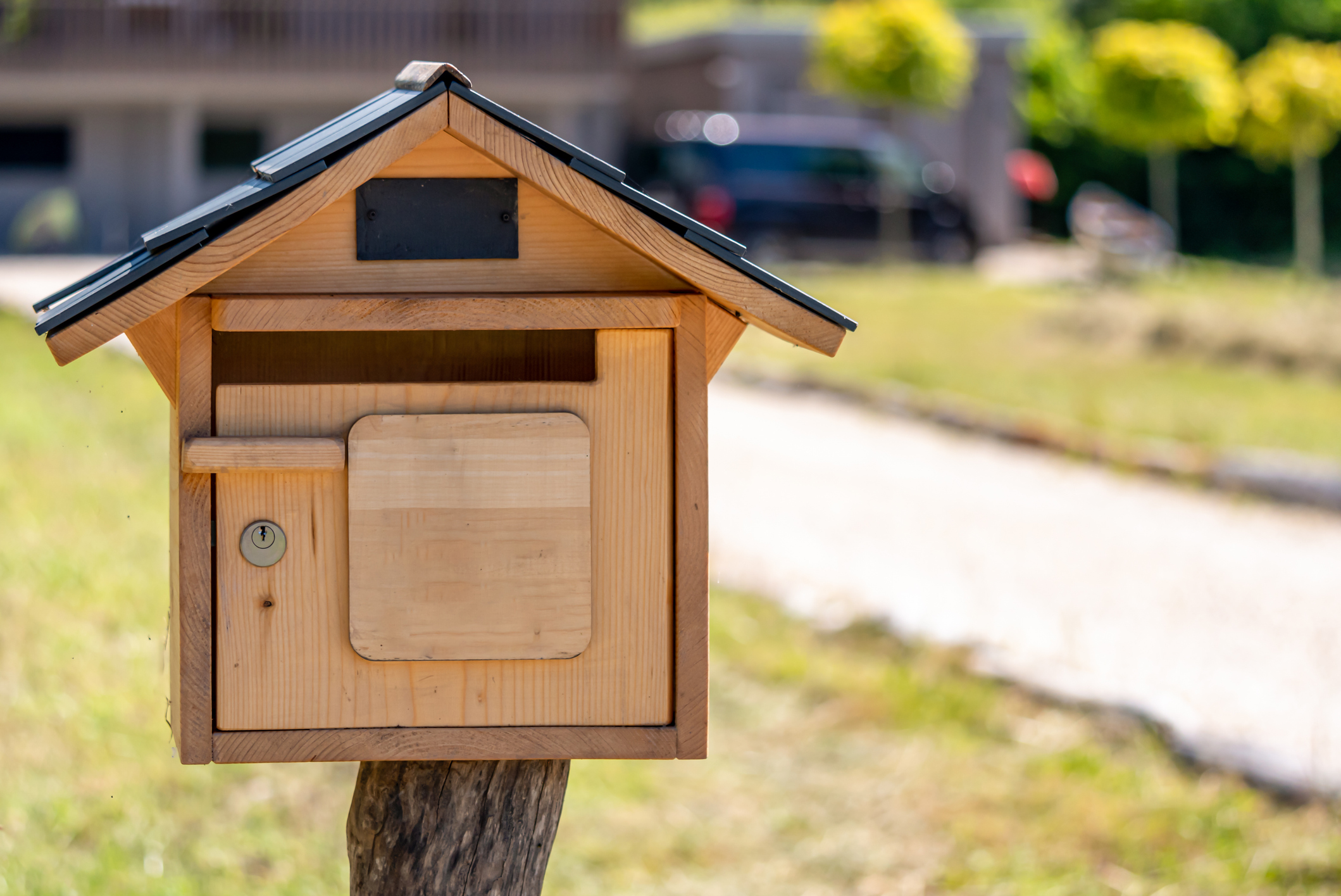 Front of Wooden Mailbox in Front of a Home, Selective Focus