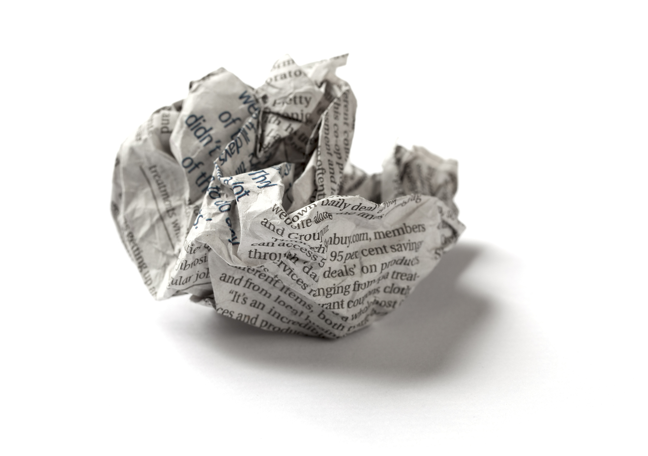 Crumbled Up Ball of a Sheet of Newspaper