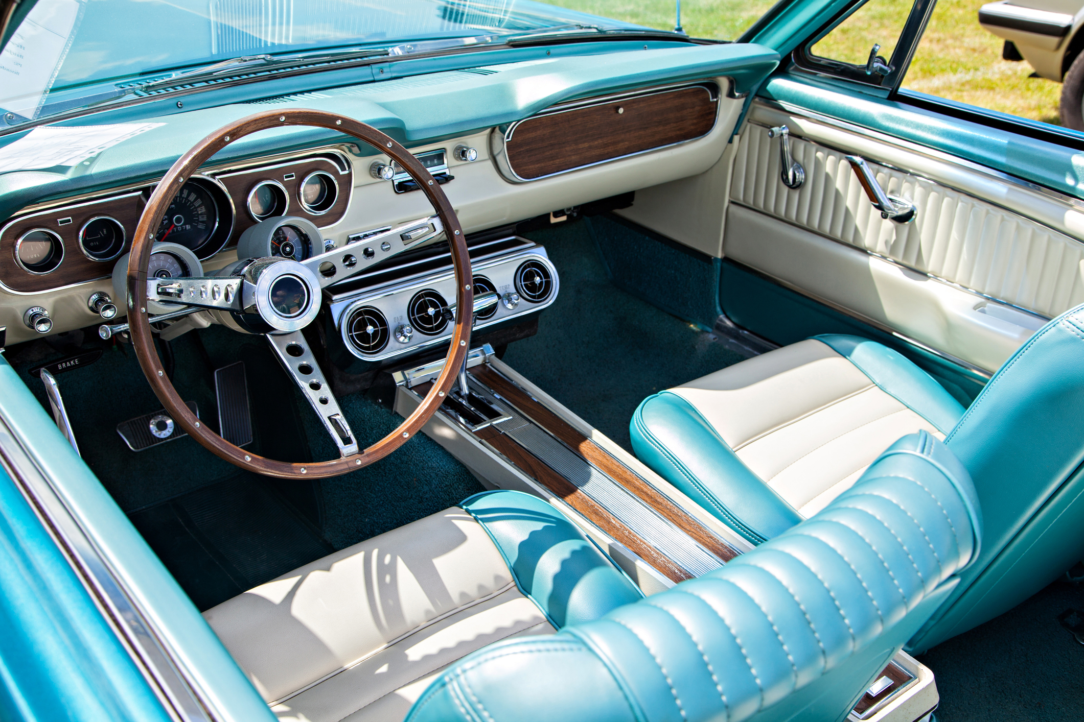 Aqua and Cream Tuck and Roll Leather Upholstery Interior of a Vintage Convertible Car