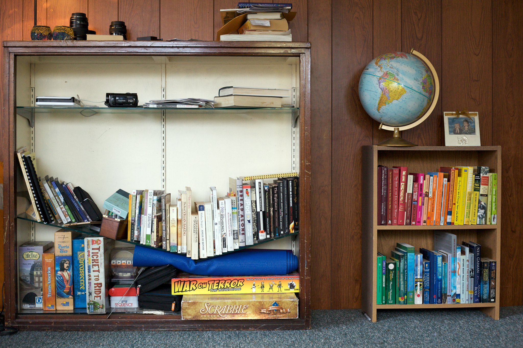 Broken Shelf Filled With Books in a Bookcase in a Living Room