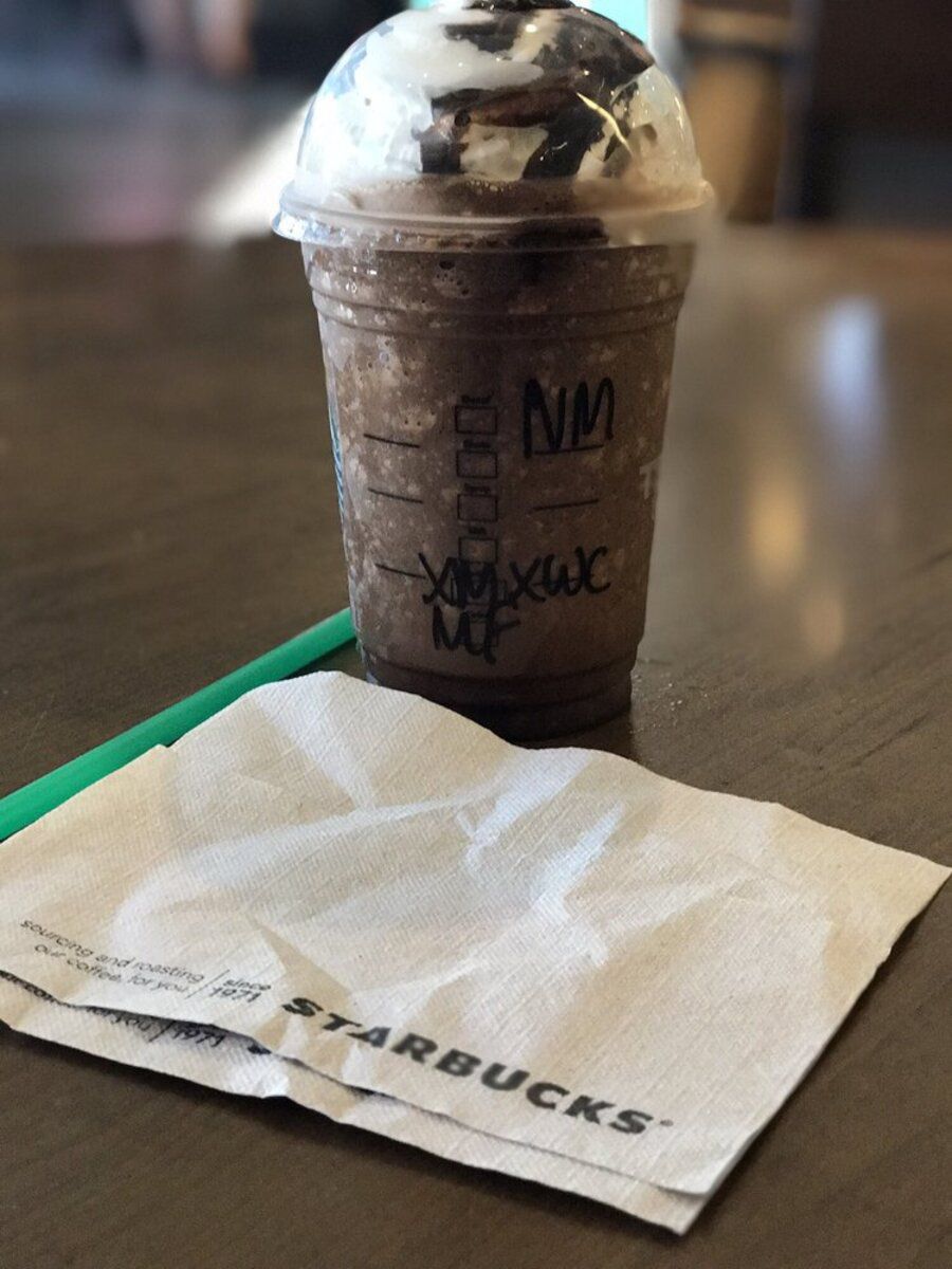 Mocha Frappe With Straw and Napkins at a Starbucks