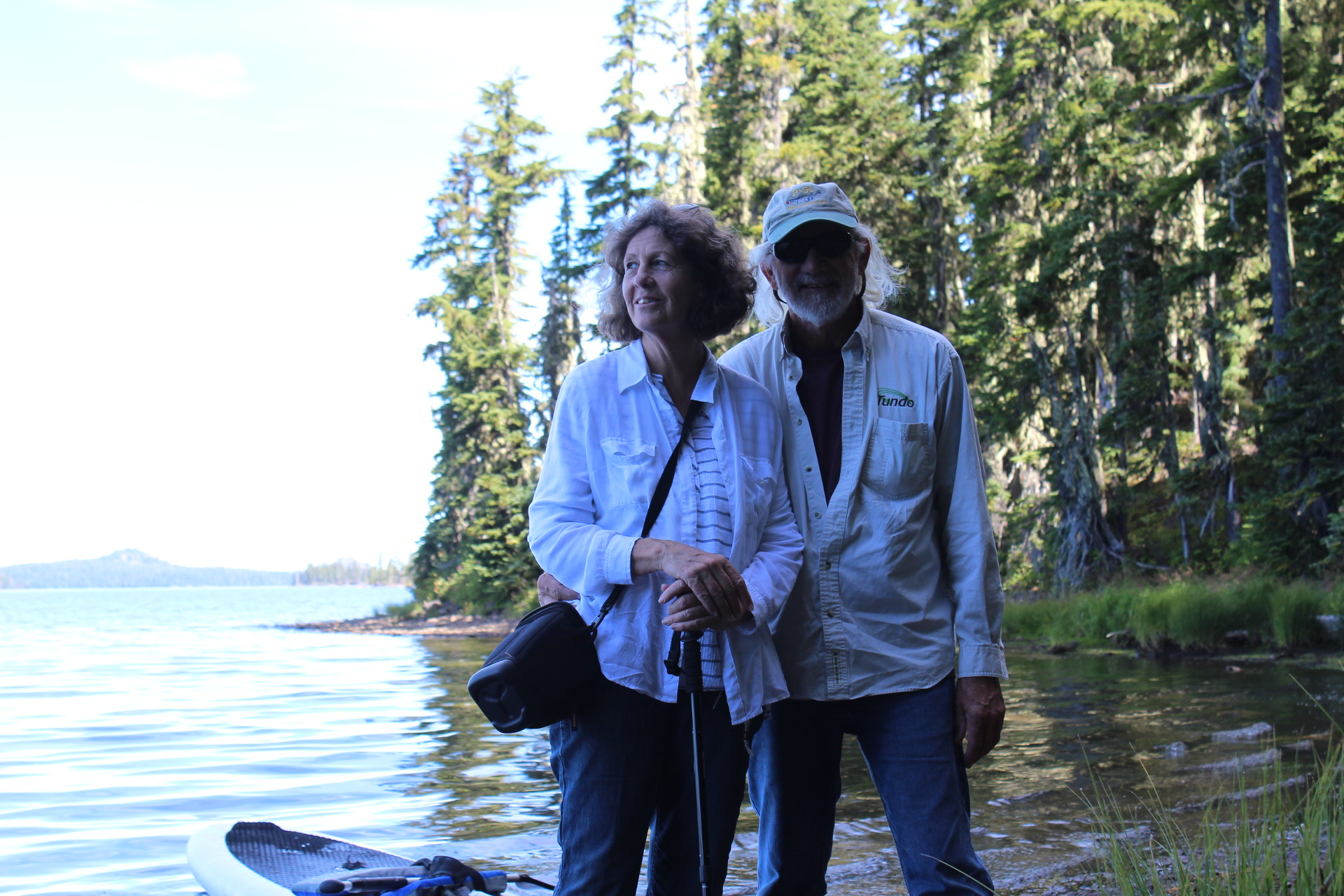 Senior Couple Enjoying a Lake and the Scenery While on a Hike, Waldo Lake, Oregon