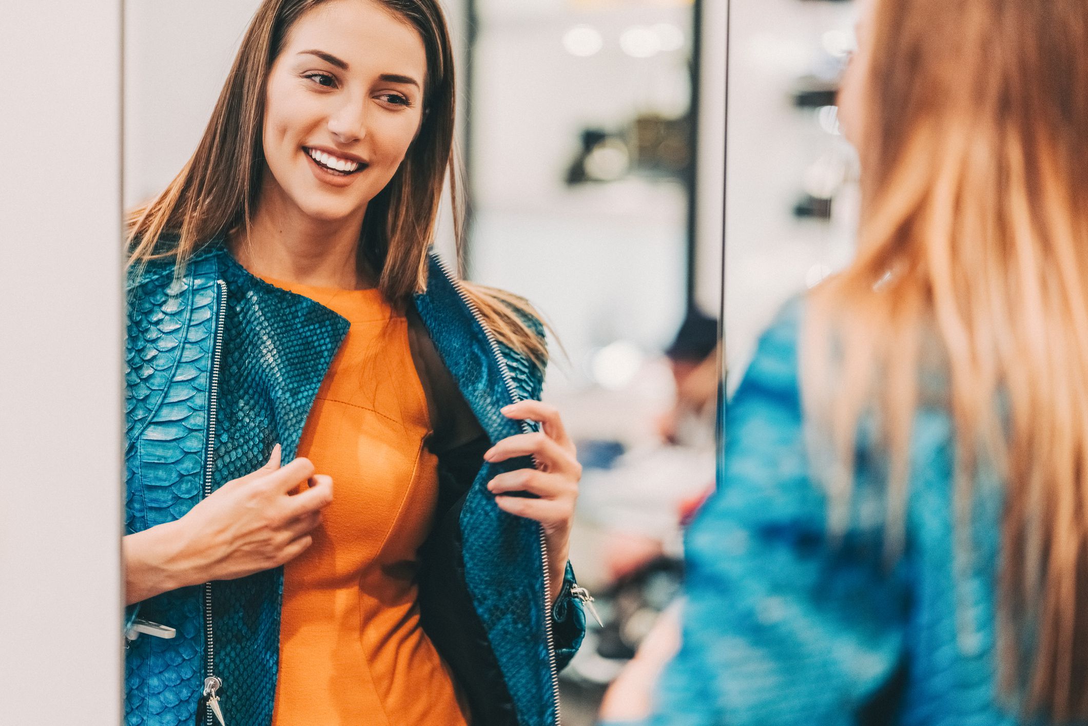 Happy women in the clothing store