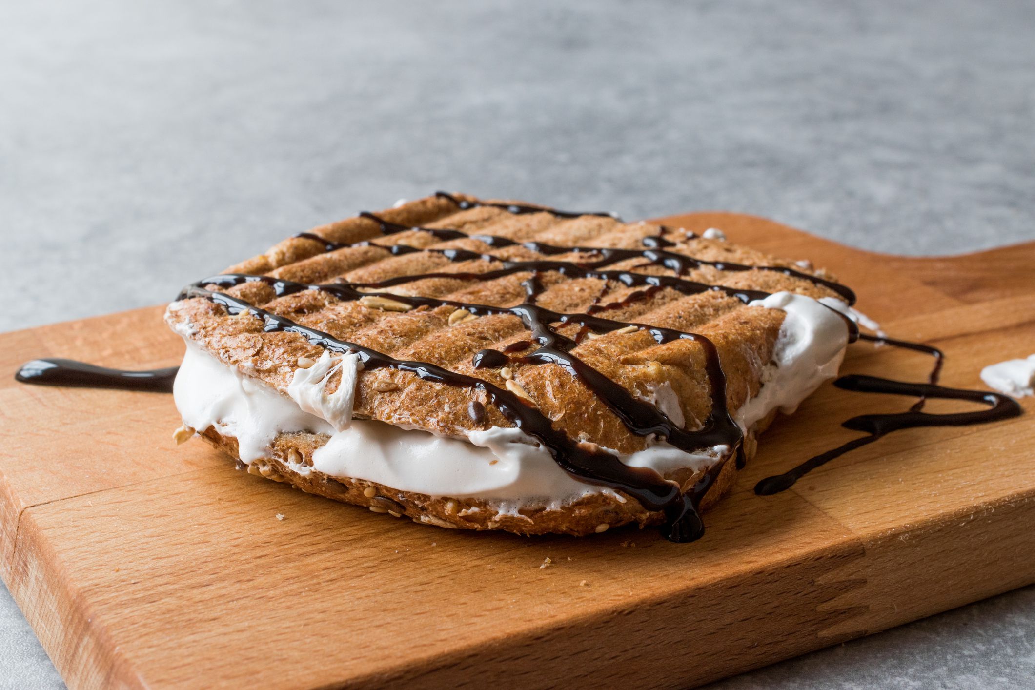 Toasted Marshmallow Sandwich with Chocolate Sauce / Fluffernutter. Confectionery Desert.