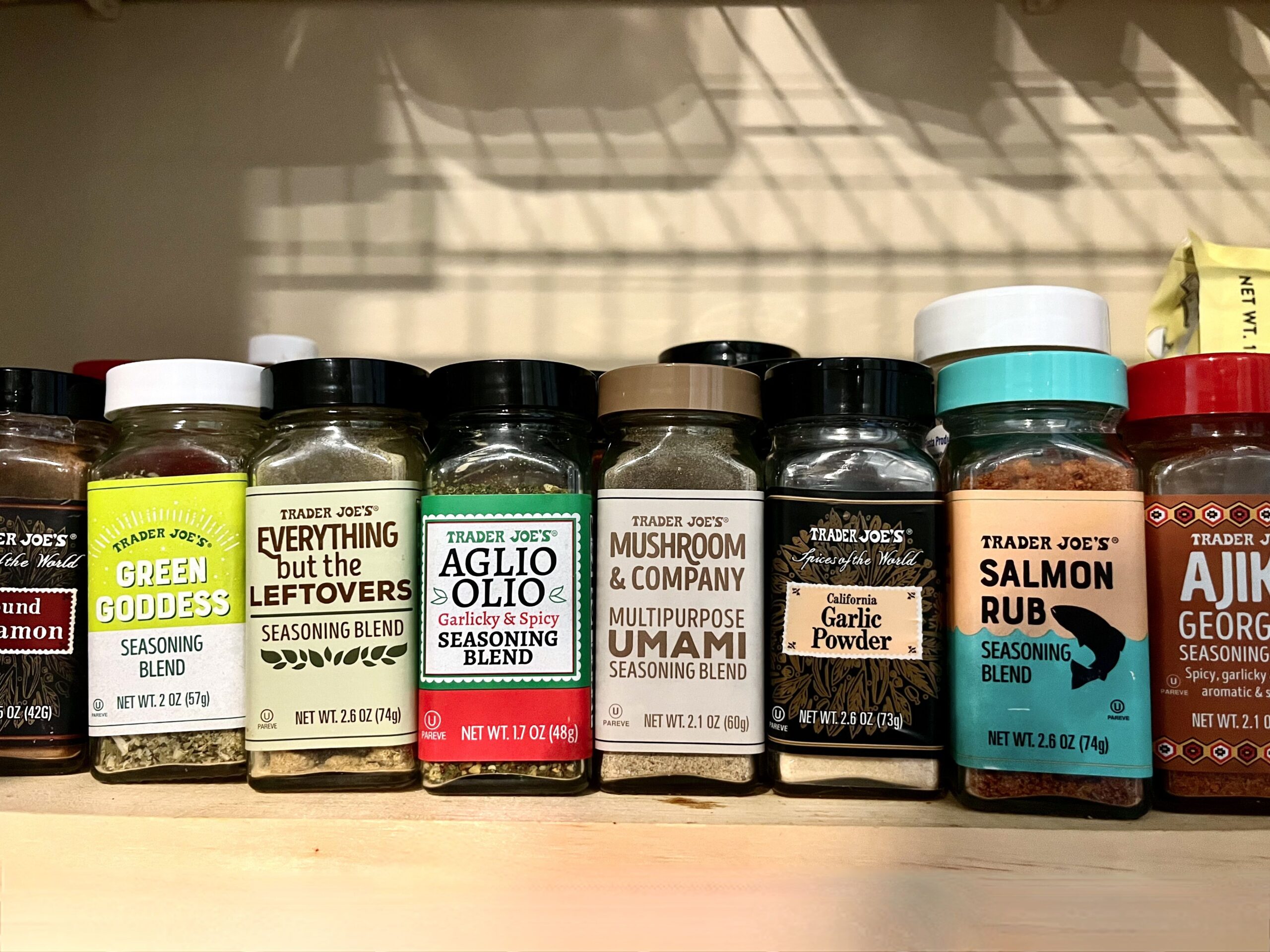 Trader Joe's seasonings: Cinnamon, green goddess, everything but the leftovers, aglio olio, mushroom umami, garlic powder, salmon rub, and Ajika georgian spice