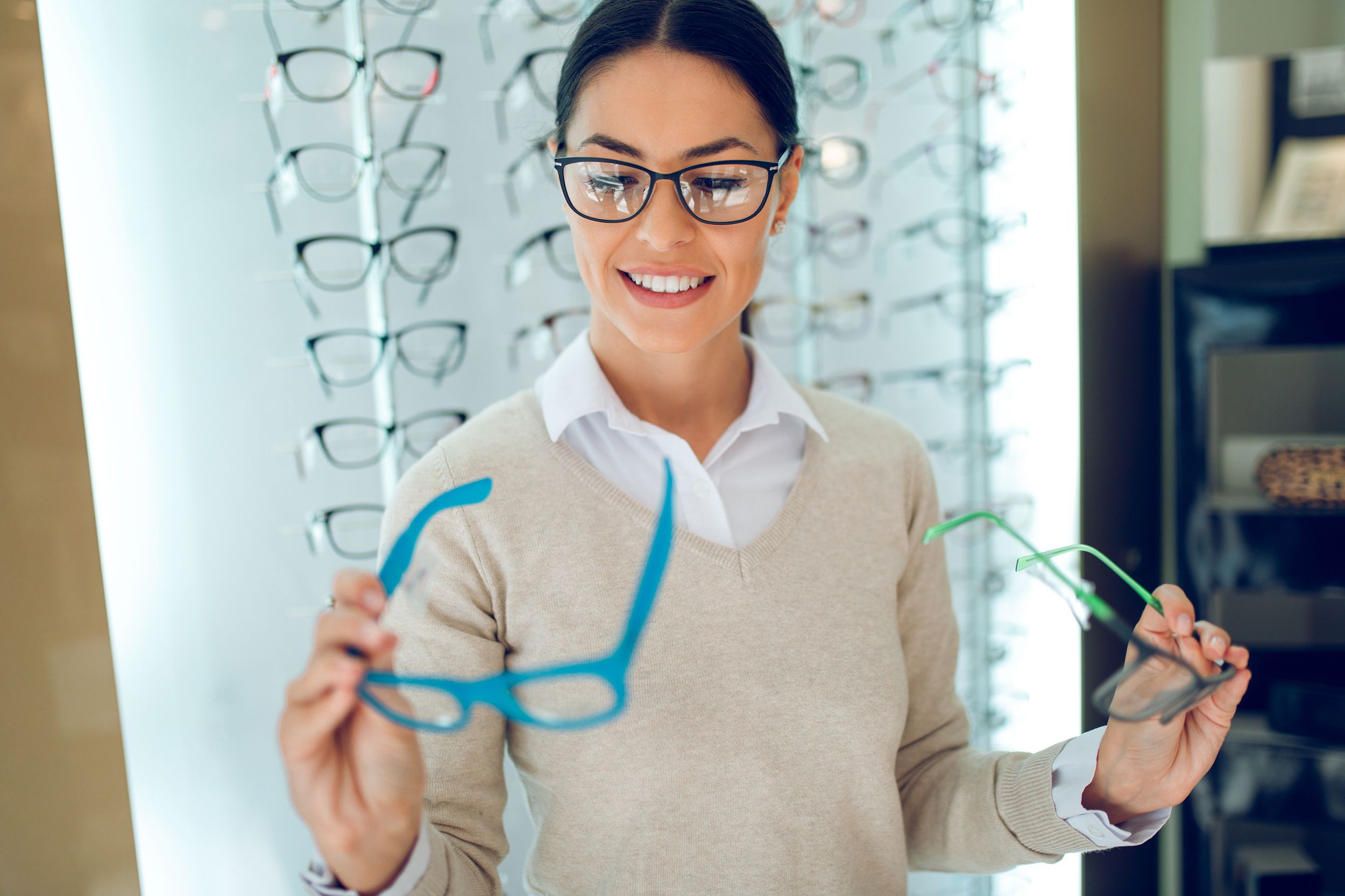 Woman buying glasses