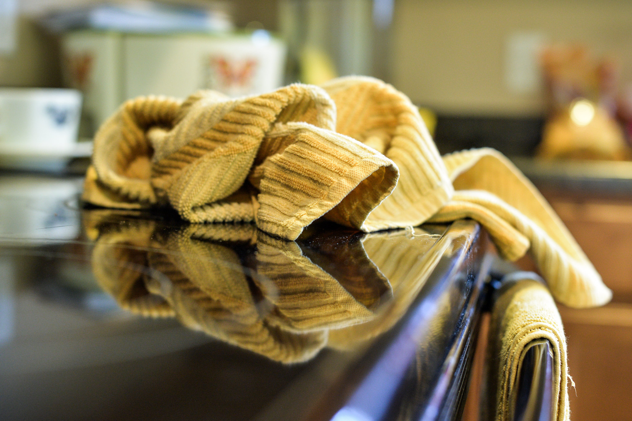 Chartreuse Yellow Kitchen Wash Cloth on Countertop, Selective Focus