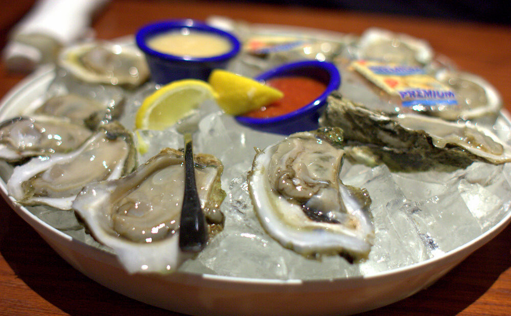 Oysters With Dipping Sauces in a Ice Bath
