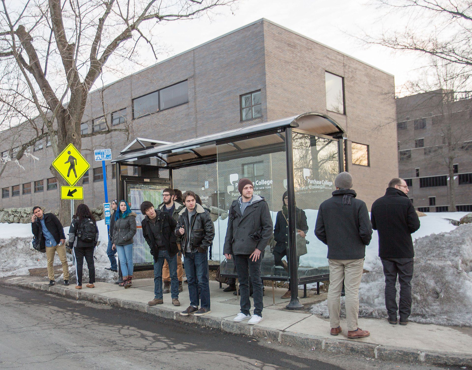 People waiting at the bus stop