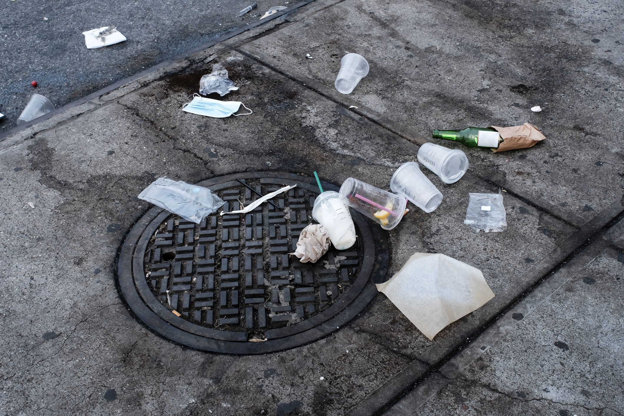 Garbage objects left on floor in public space