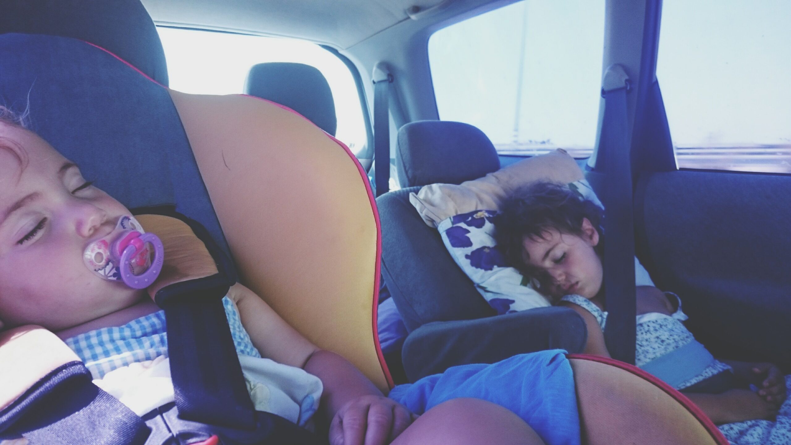 Children Sleeping In Car