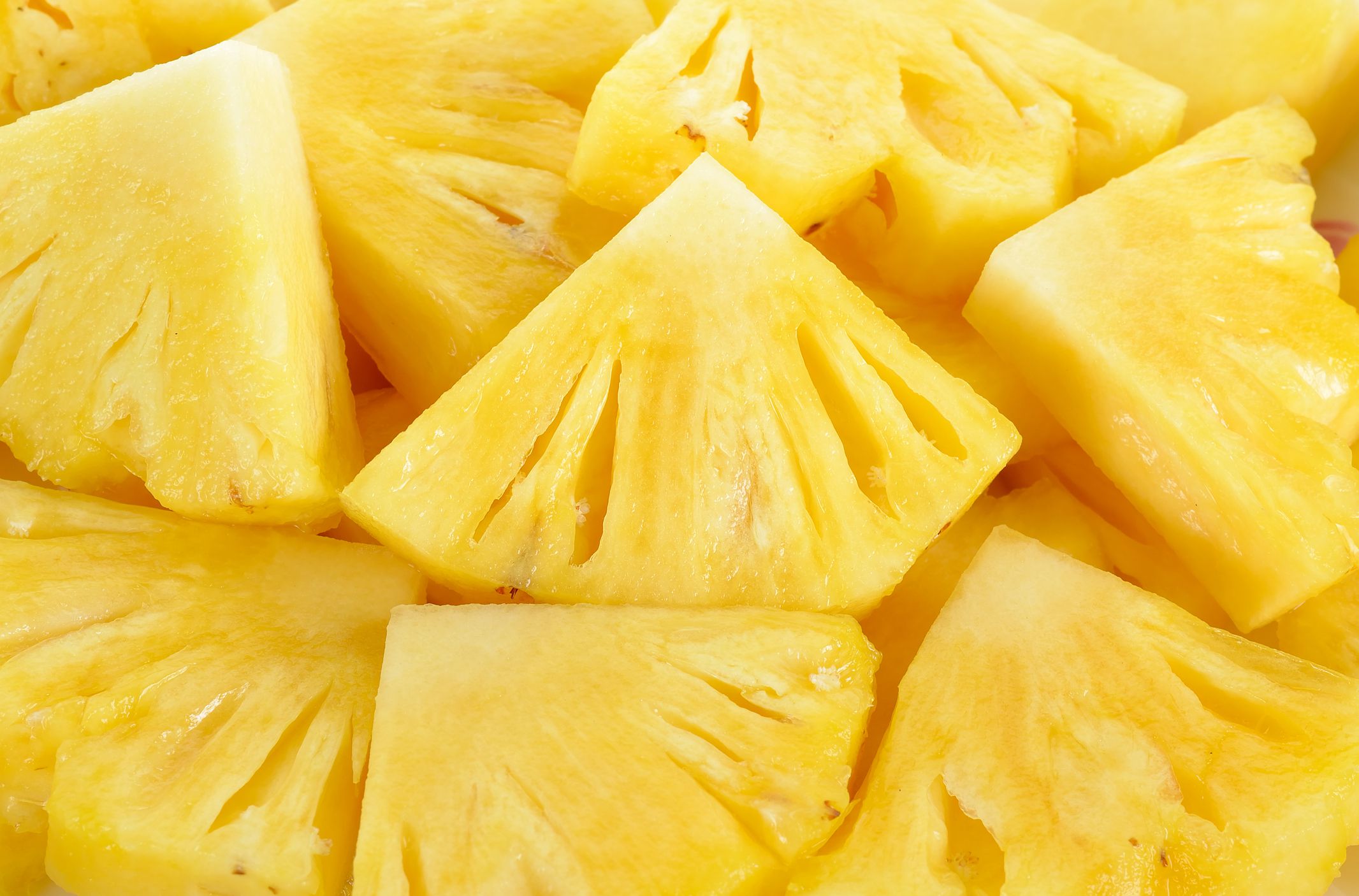 Close up slice pineapple background texture.