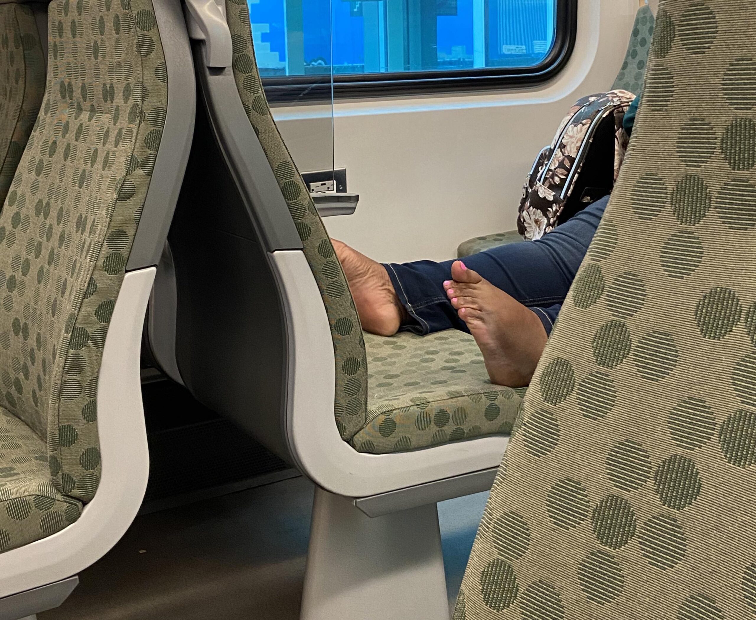 Bare Feet on Train
