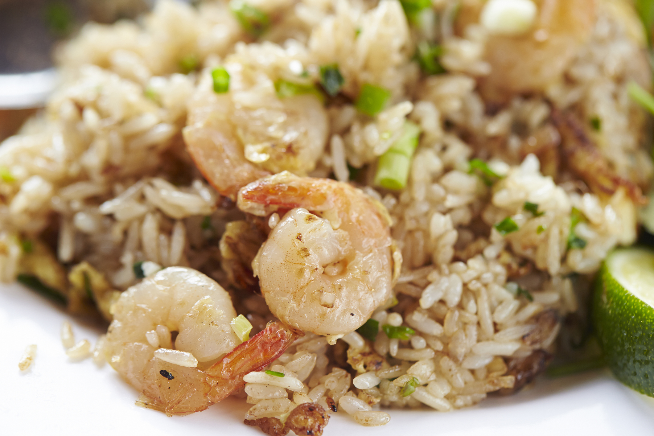Closeup of Chinese Shrimp Fried Rice on a White Plate