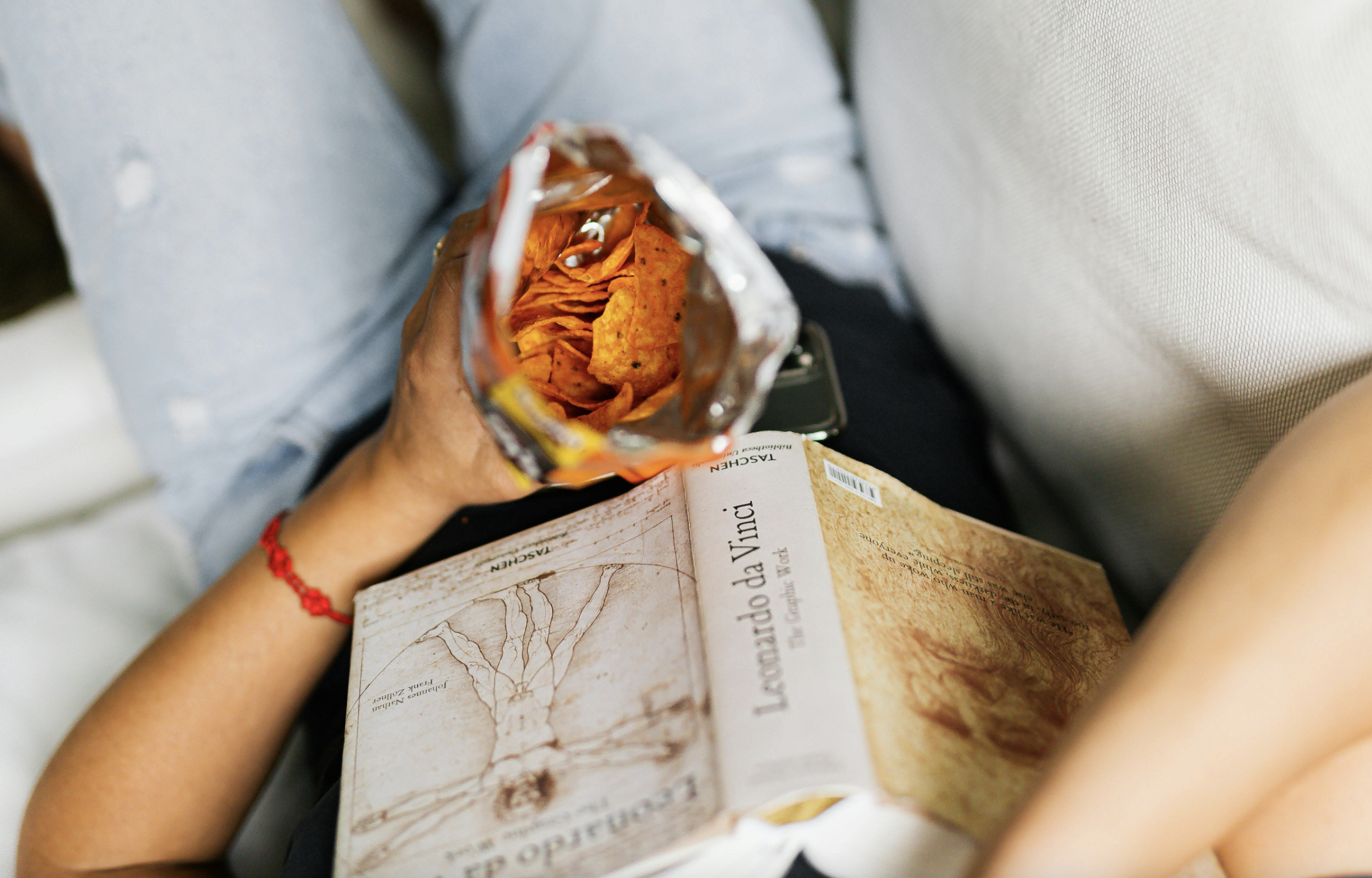 Eating chips and reading
