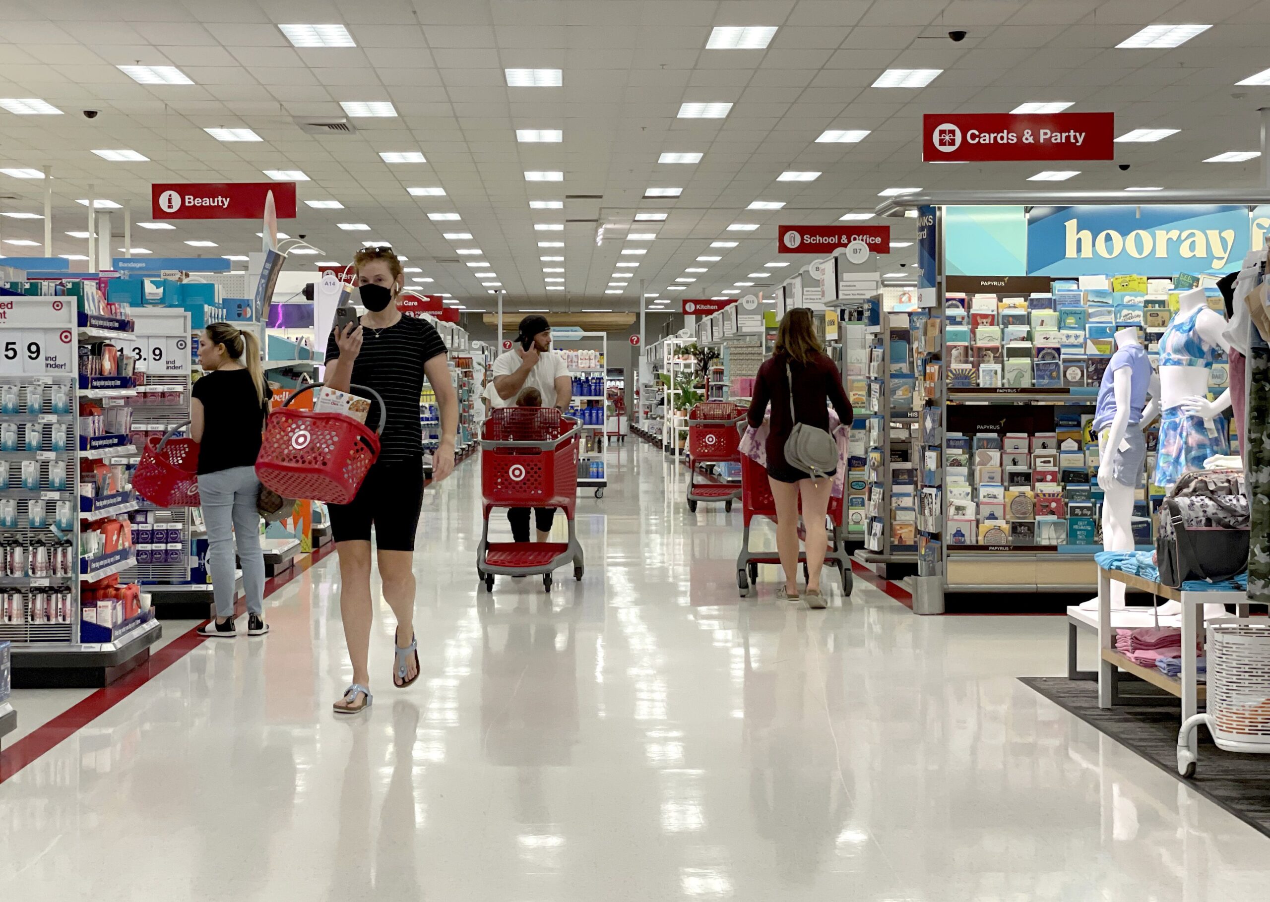 Customers shop at a Target store
