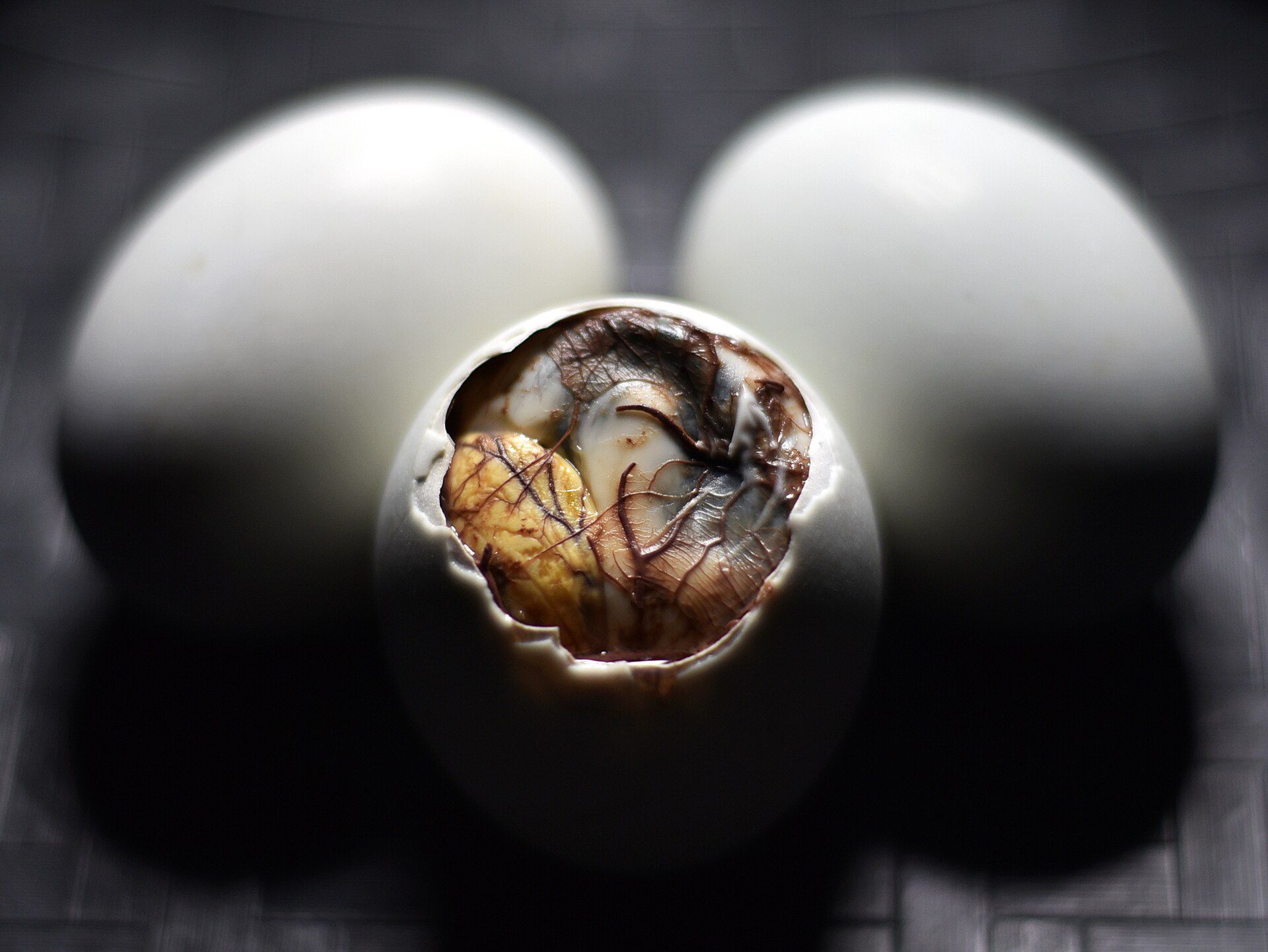 Balut is a popular street food in the Philippines. It is a steamed or boiled fertilized developing duck egg embryo.