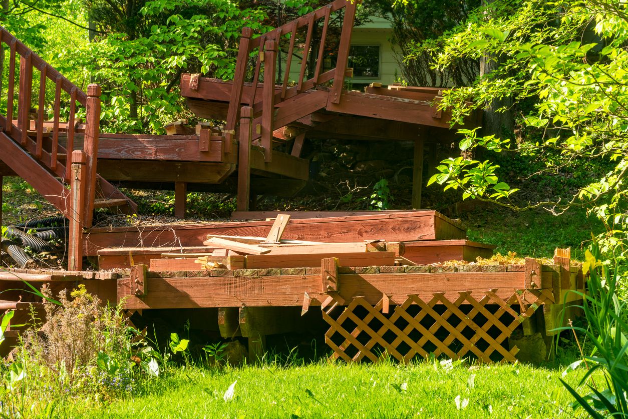 Dilapidated deck in a backyard