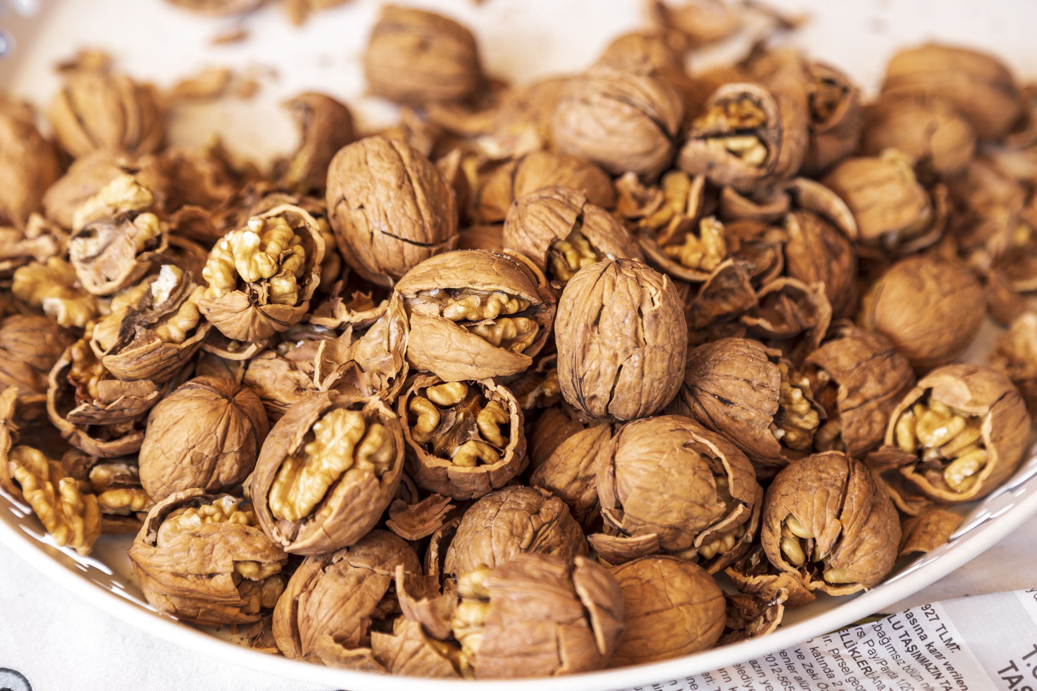pilled walnut isolated on white background. Composition from nuts on the white isolated background