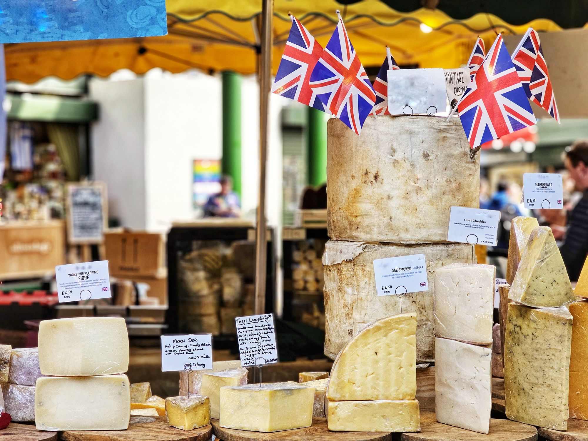 An array of British made cheese on display at Borough Market in London, UK.